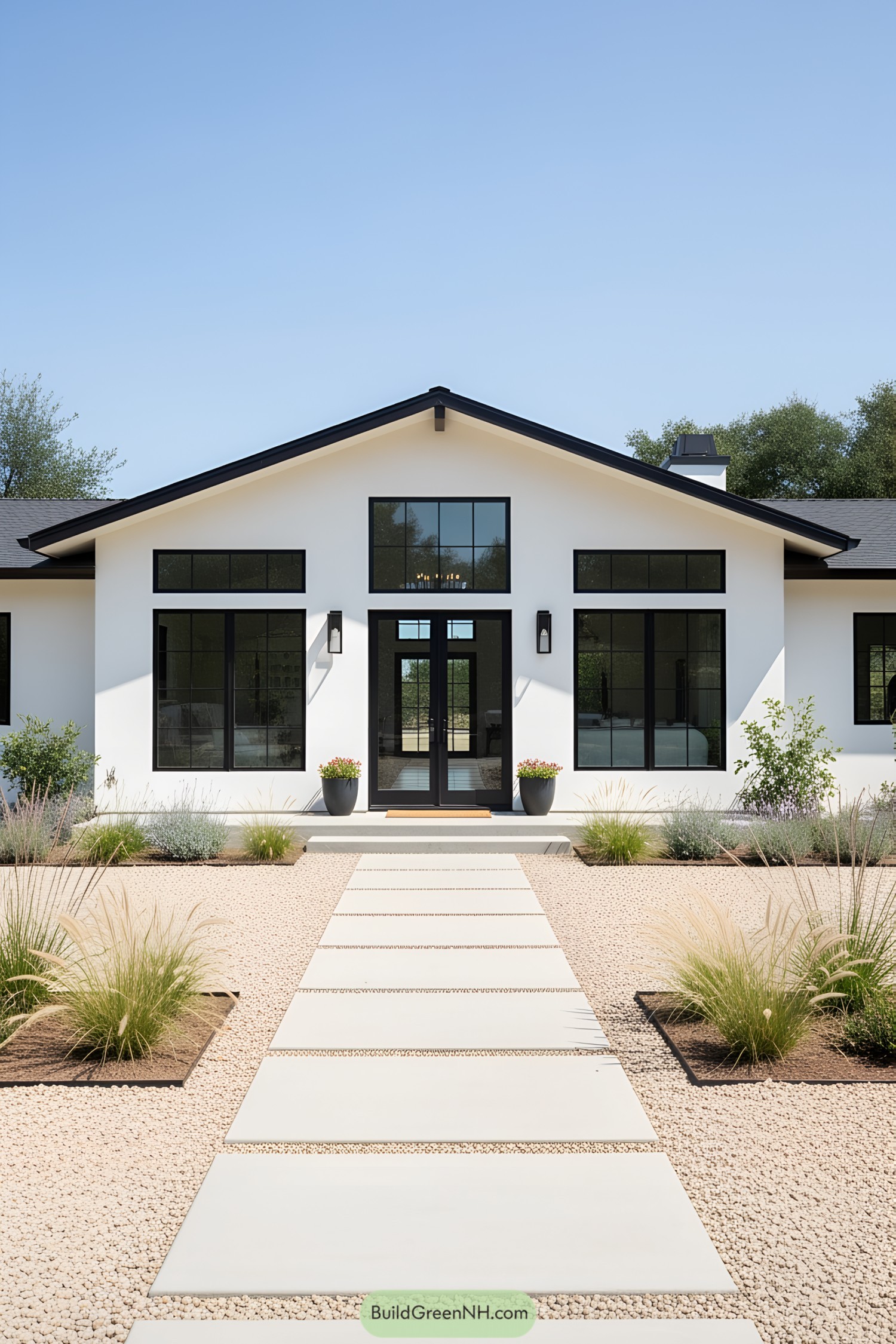A sleek, modern white ranch house with large black-framed windows