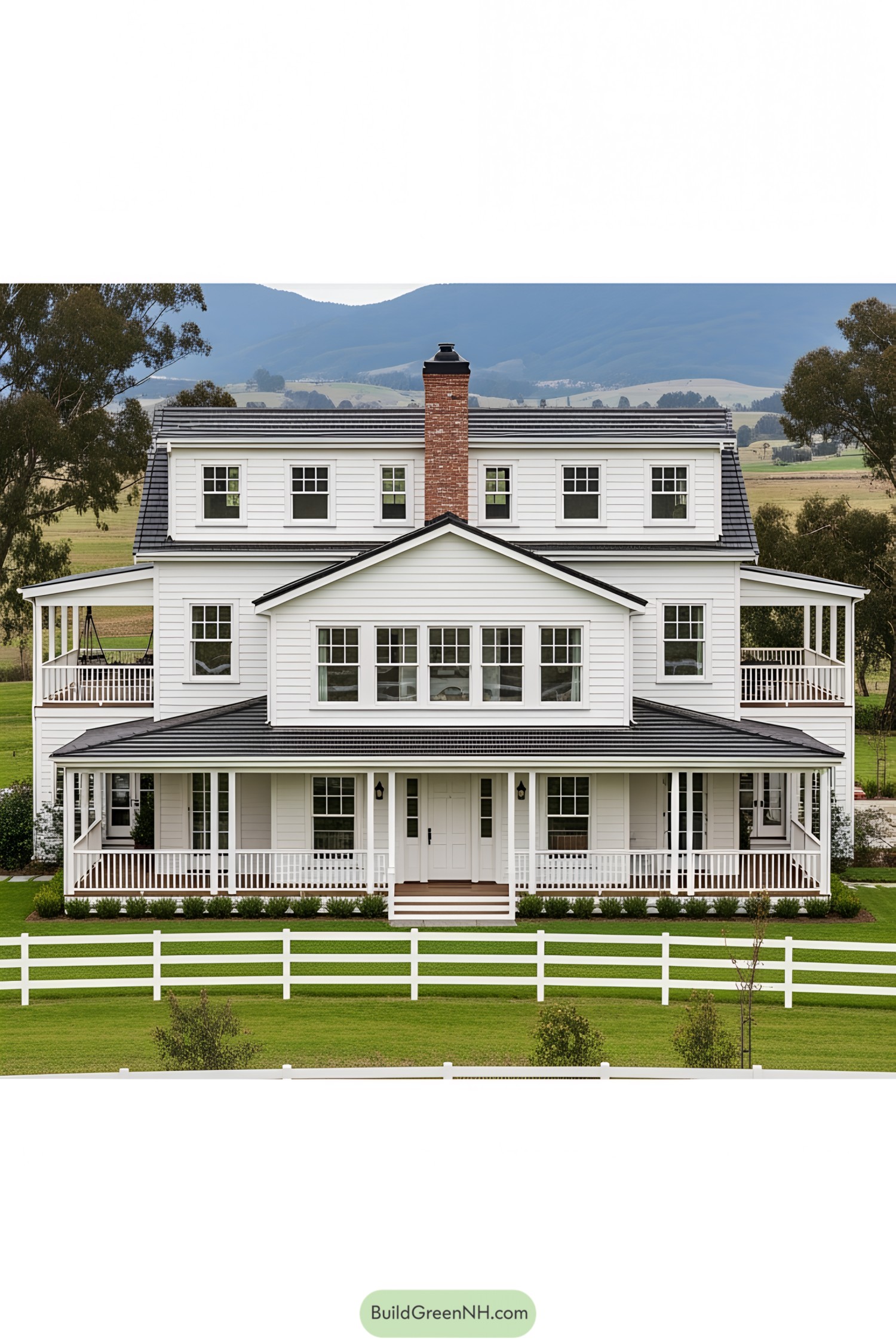 White ranch house with symmetrical design and surrounding landscape