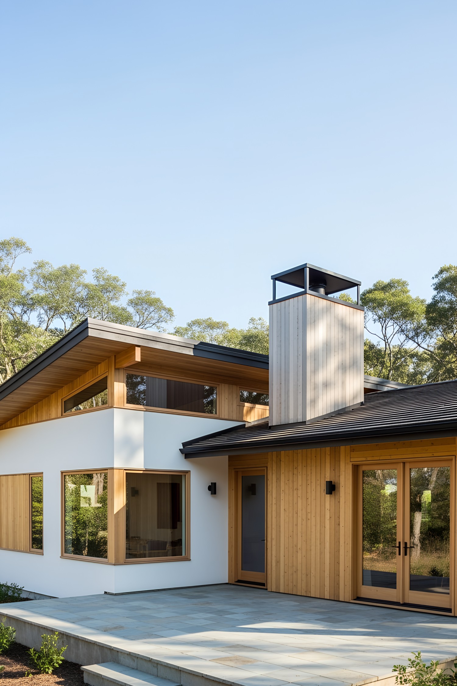 Modern Irish cottage with wood and glass elements
