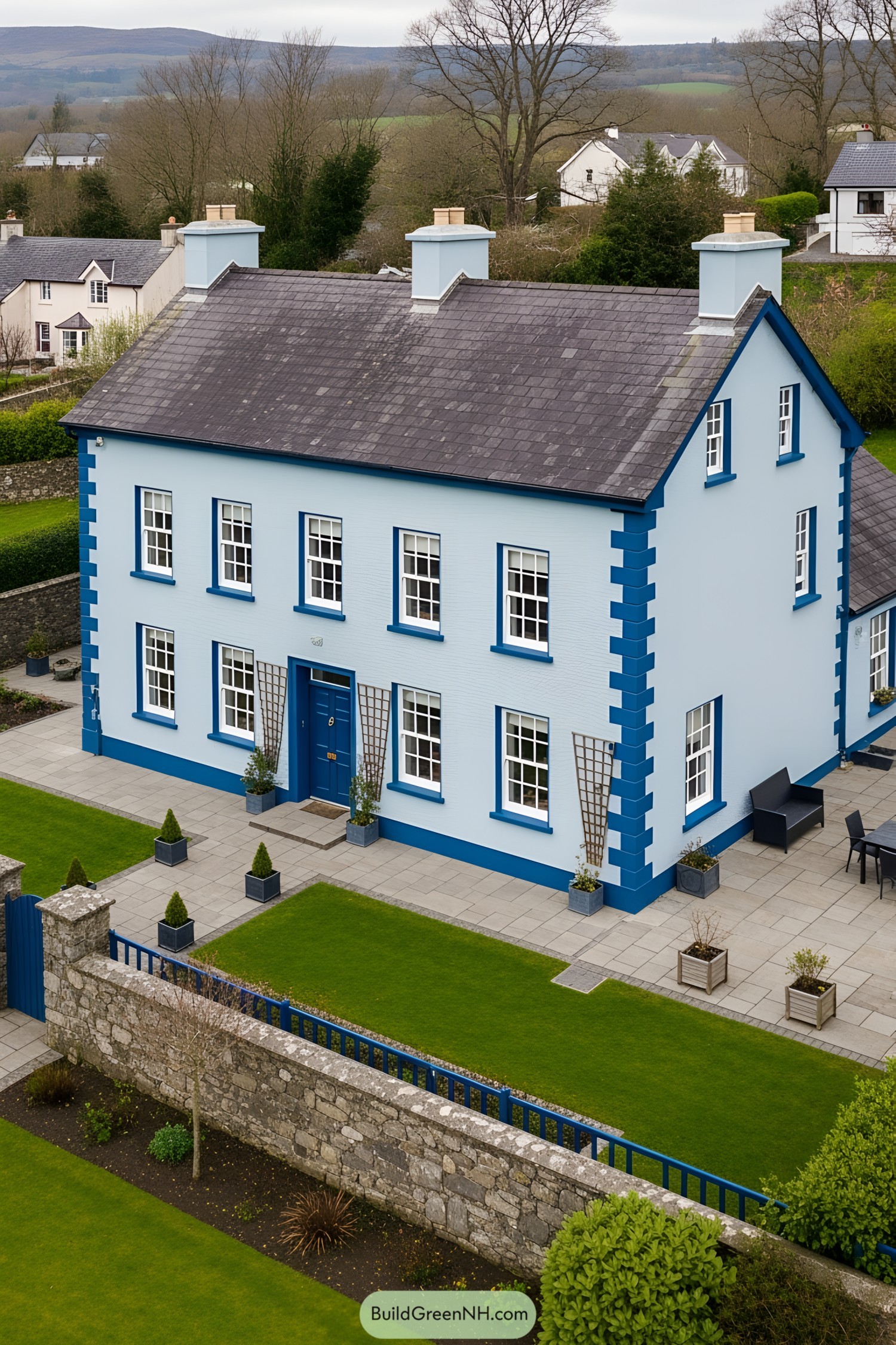Blue and White Farmhouse with Stone Walls