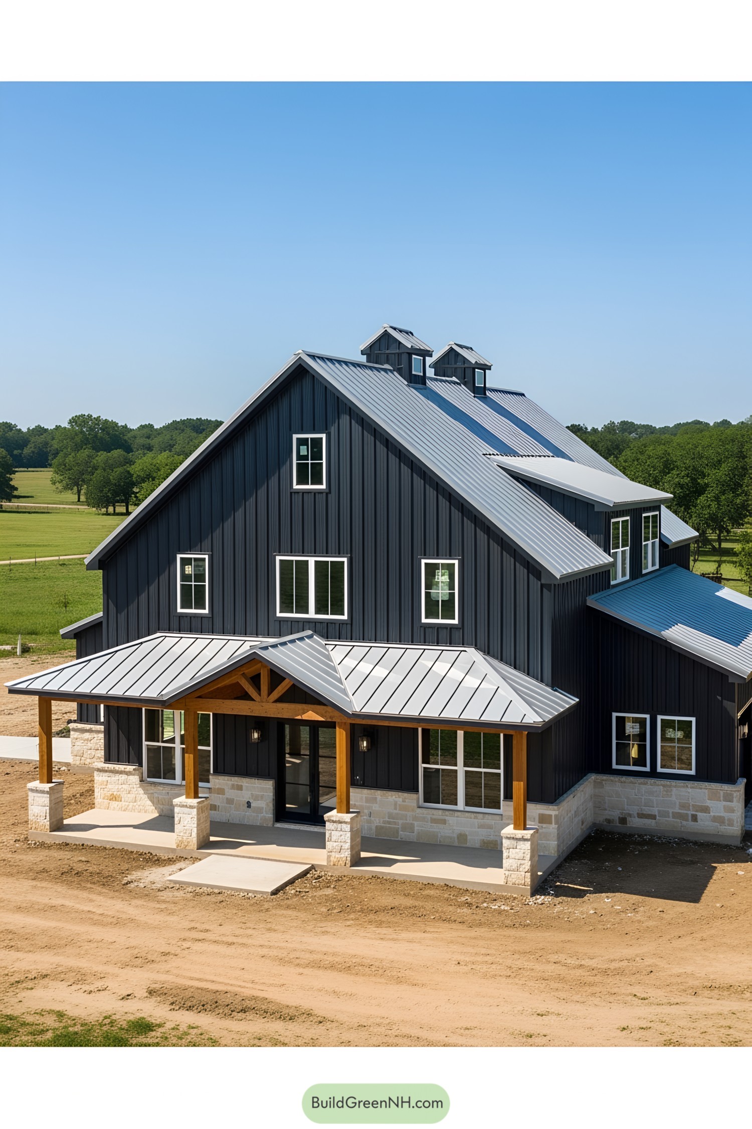 All-black barndominium nestled in lush greenery