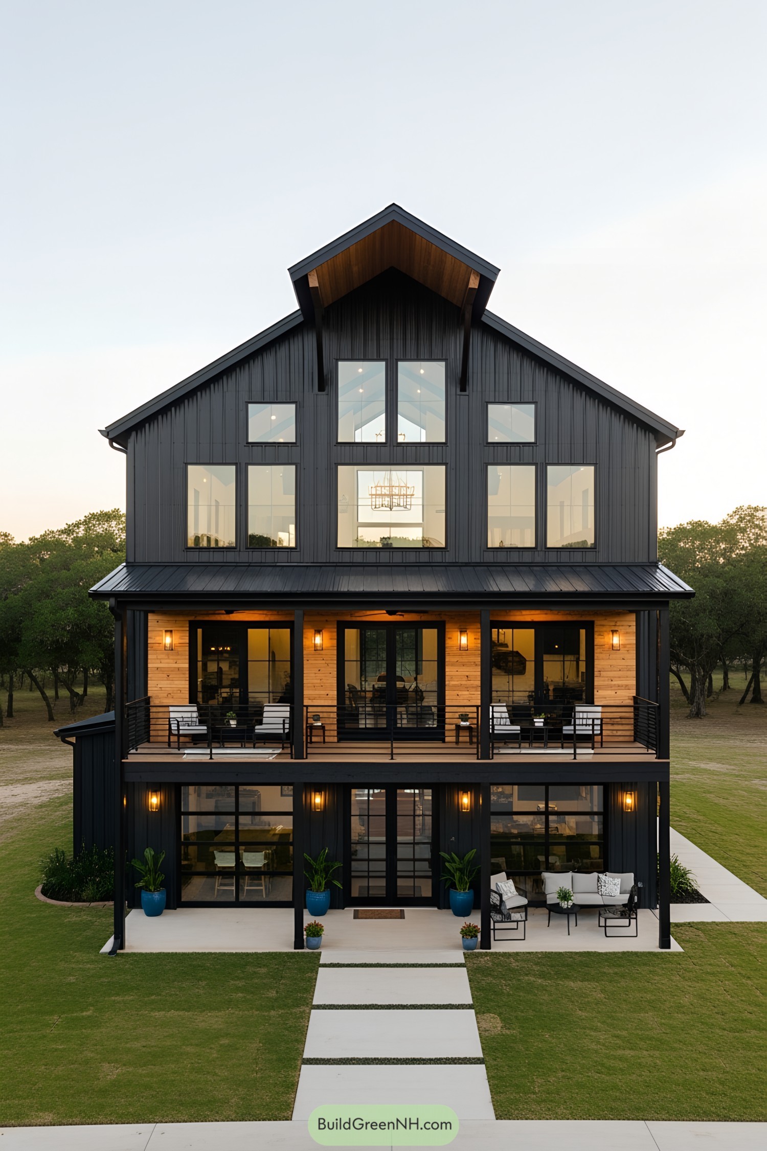 Modern black barndominium with extensive glass windows