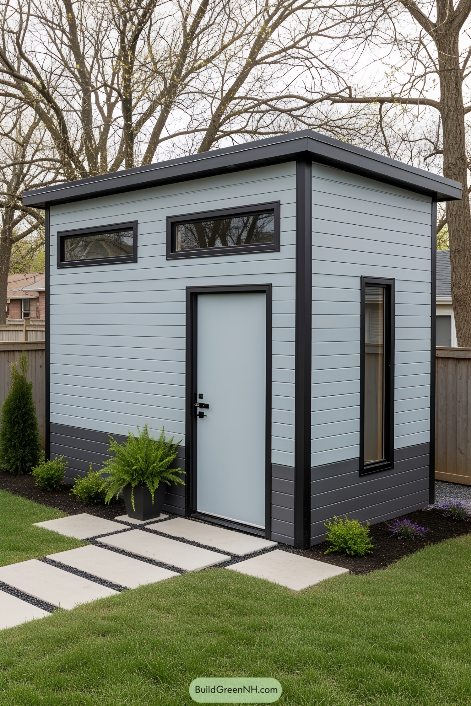 Compact contemporary backyard shed with large windows