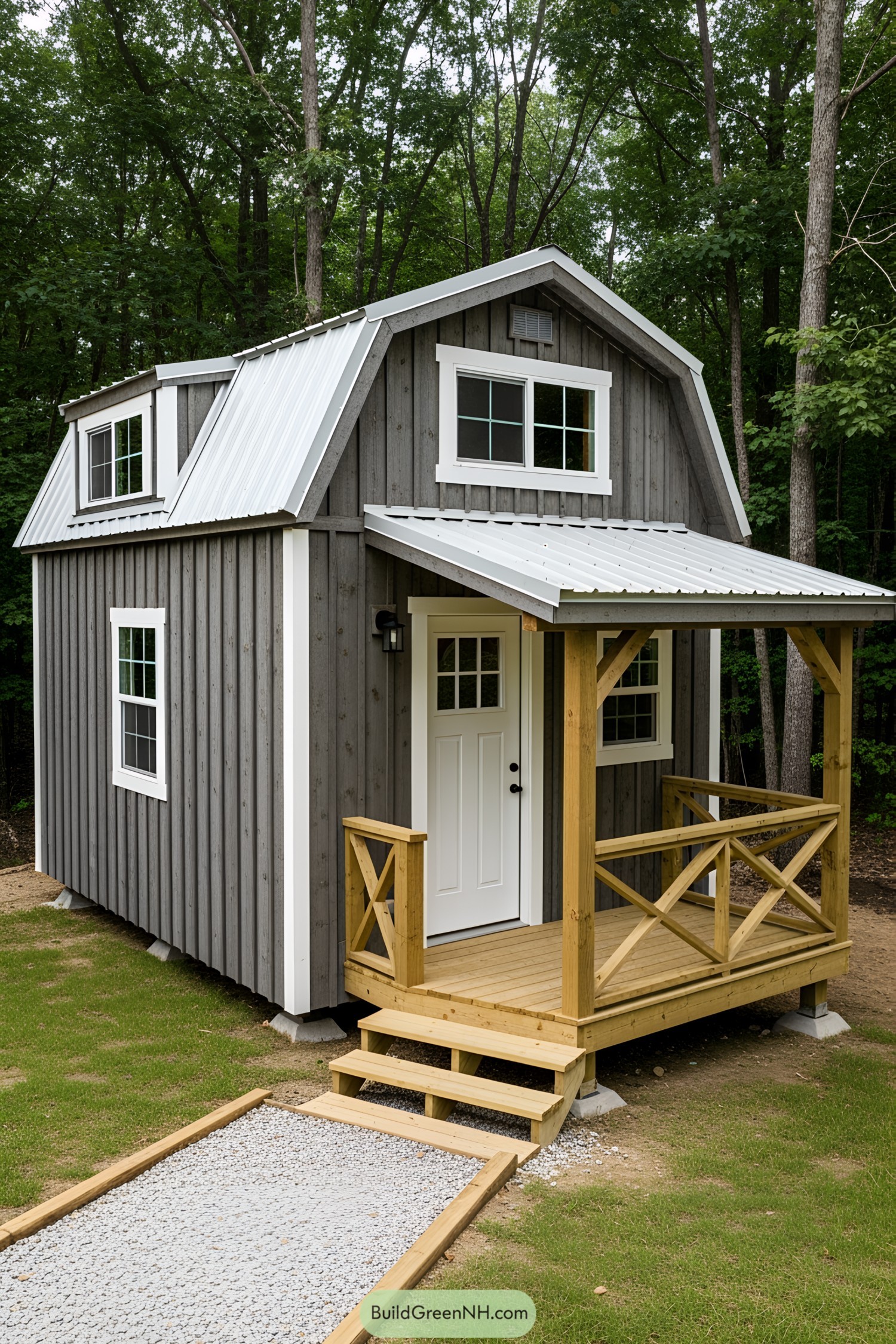 Tiny barn house with gambrel roof and front porch