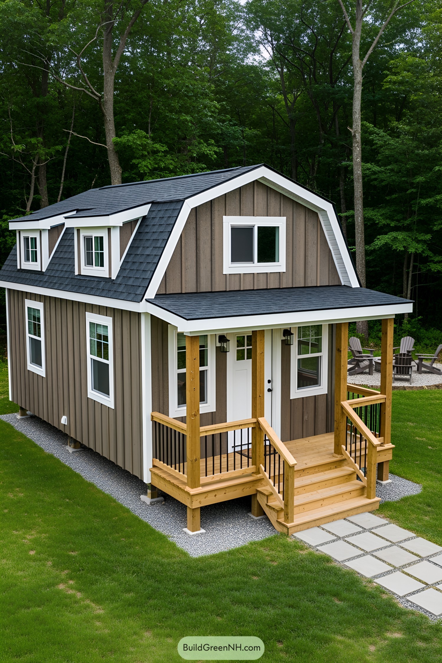 Tiny barn house with porch in a forest setting