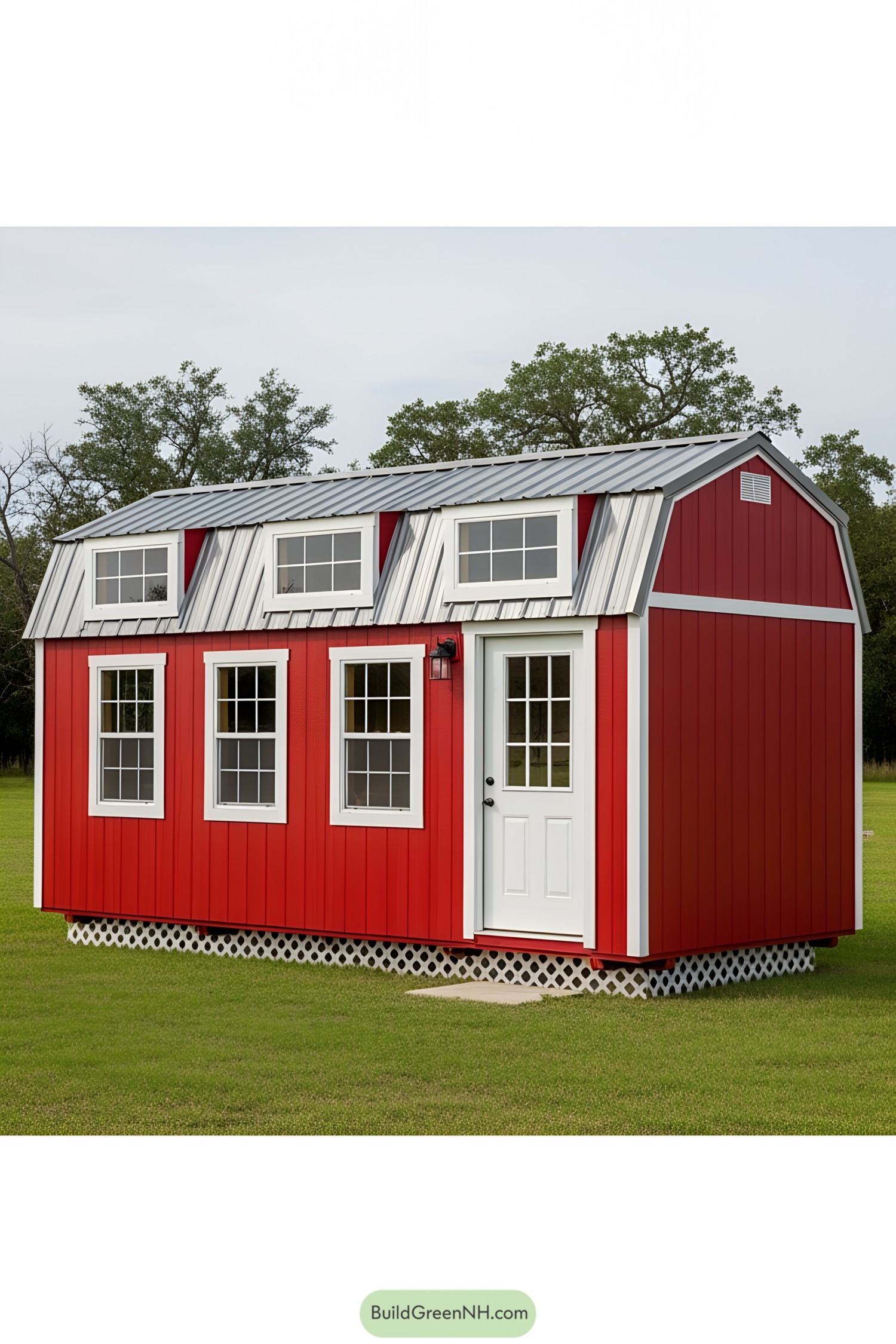 Bright red barn-style tiny house with white trim and a metal roof