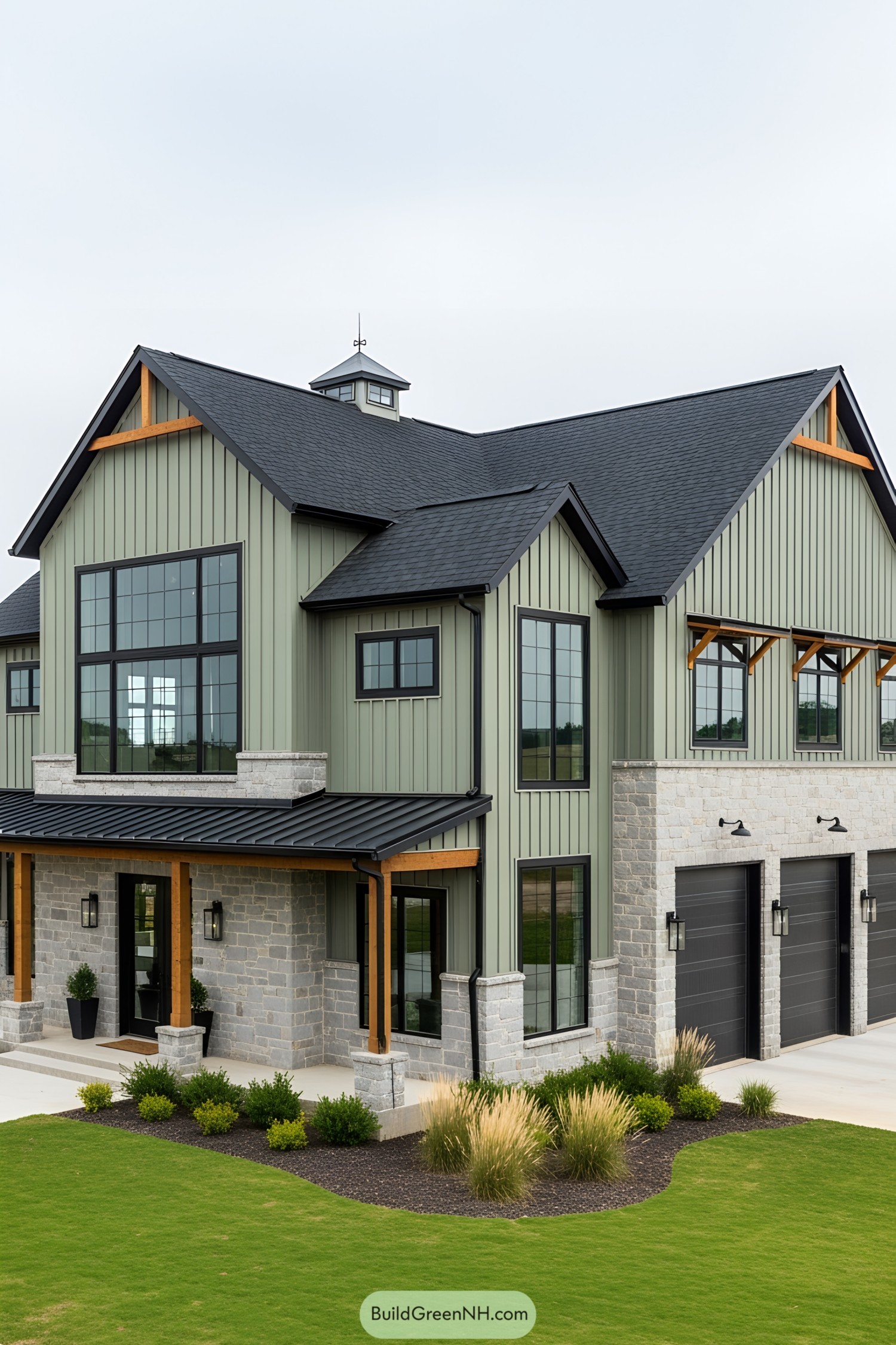 Spacious barn home with large windows and green siding