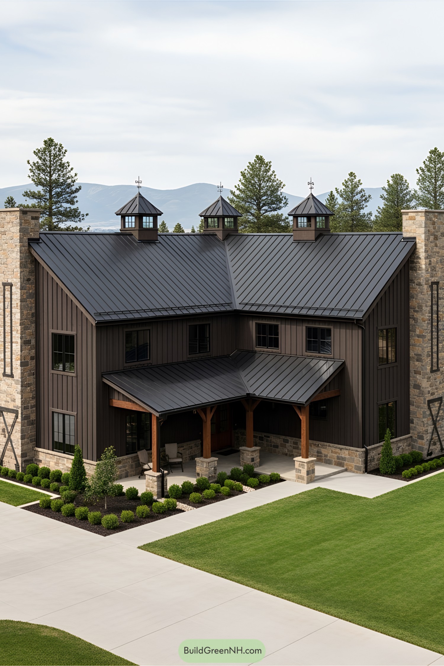 Impressive barn-style mansion with manicured lawn