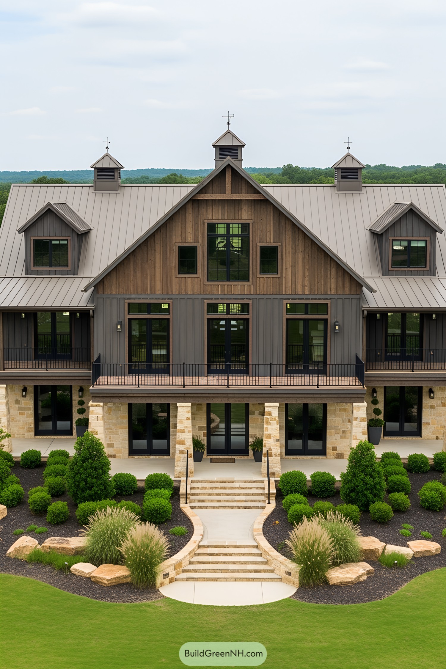 Modern barndominium with rustic charm and lush landscaping
