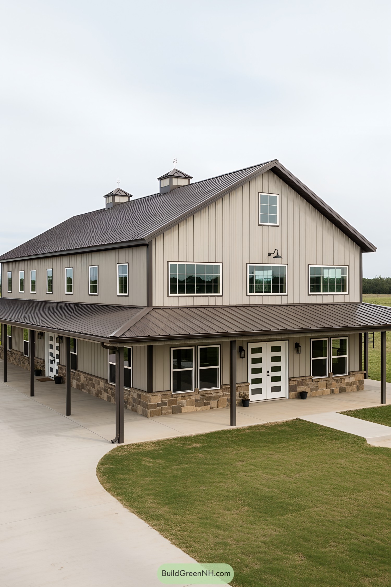 A modern barndominium with a poolside view
