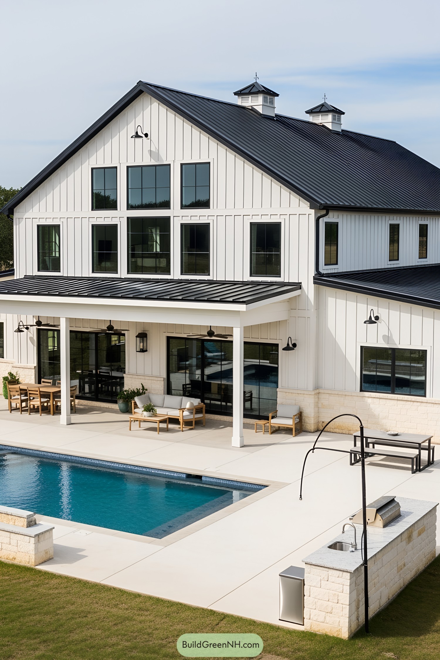 Stylish barndominium with a pool and patio