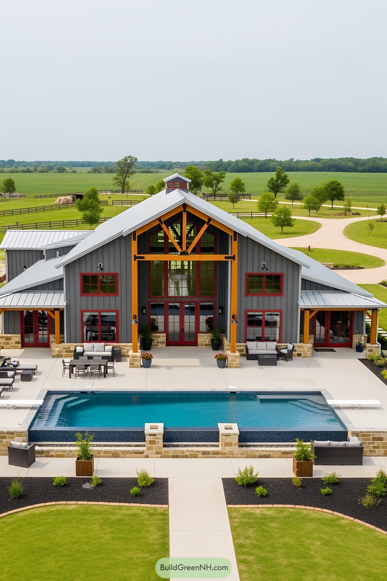 Modern barn with pool and countryside backdrop