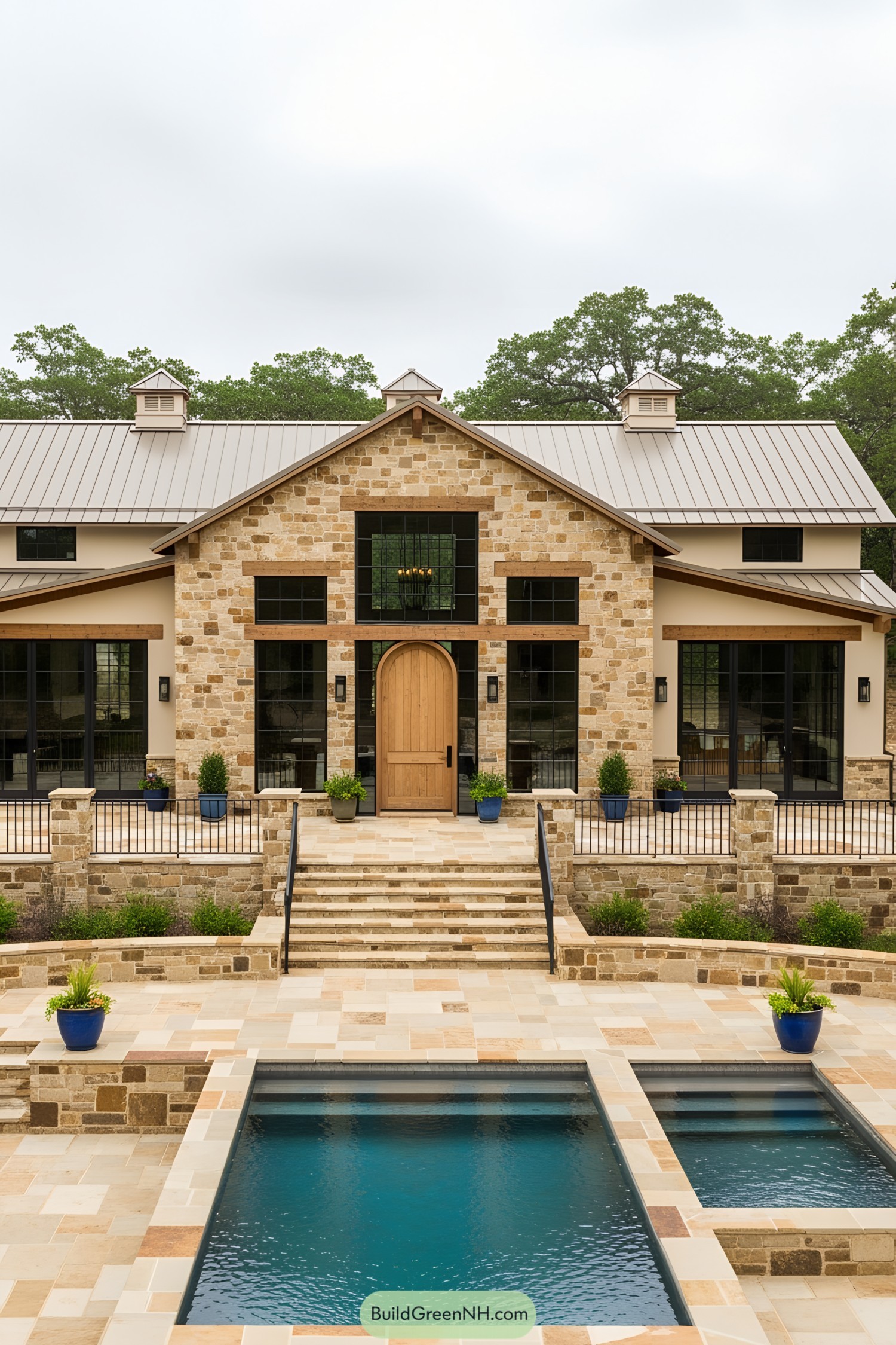 Barndominium with a stylish pool and stone facade