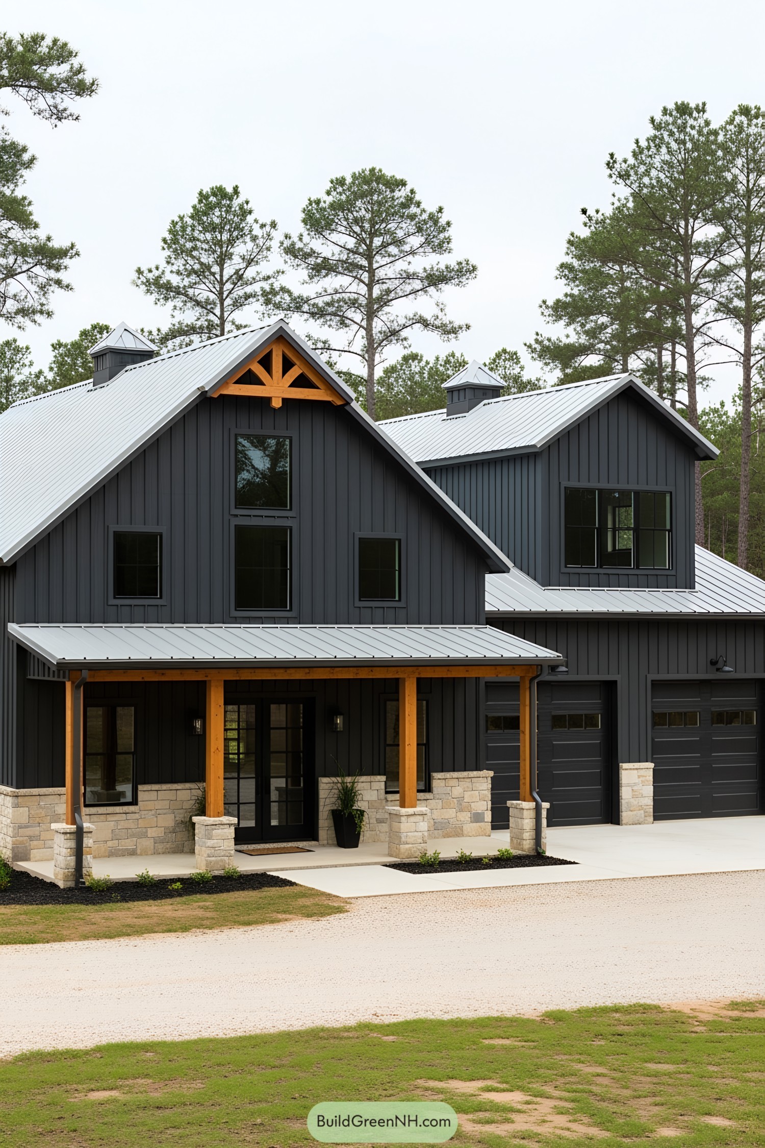 Black barndominium with stone facade and wood accents