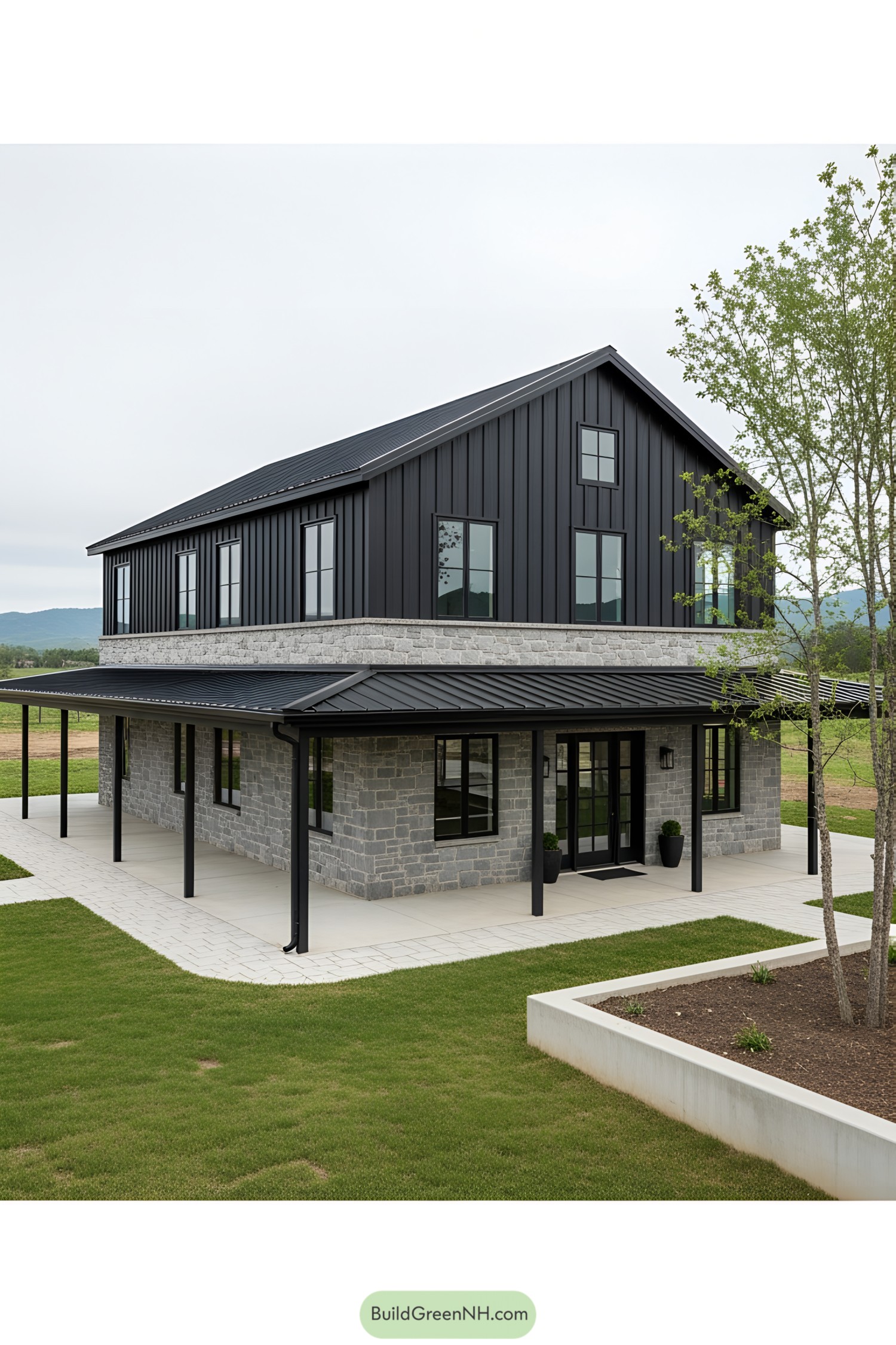 Black barndominium with stone accents and wraparound porch