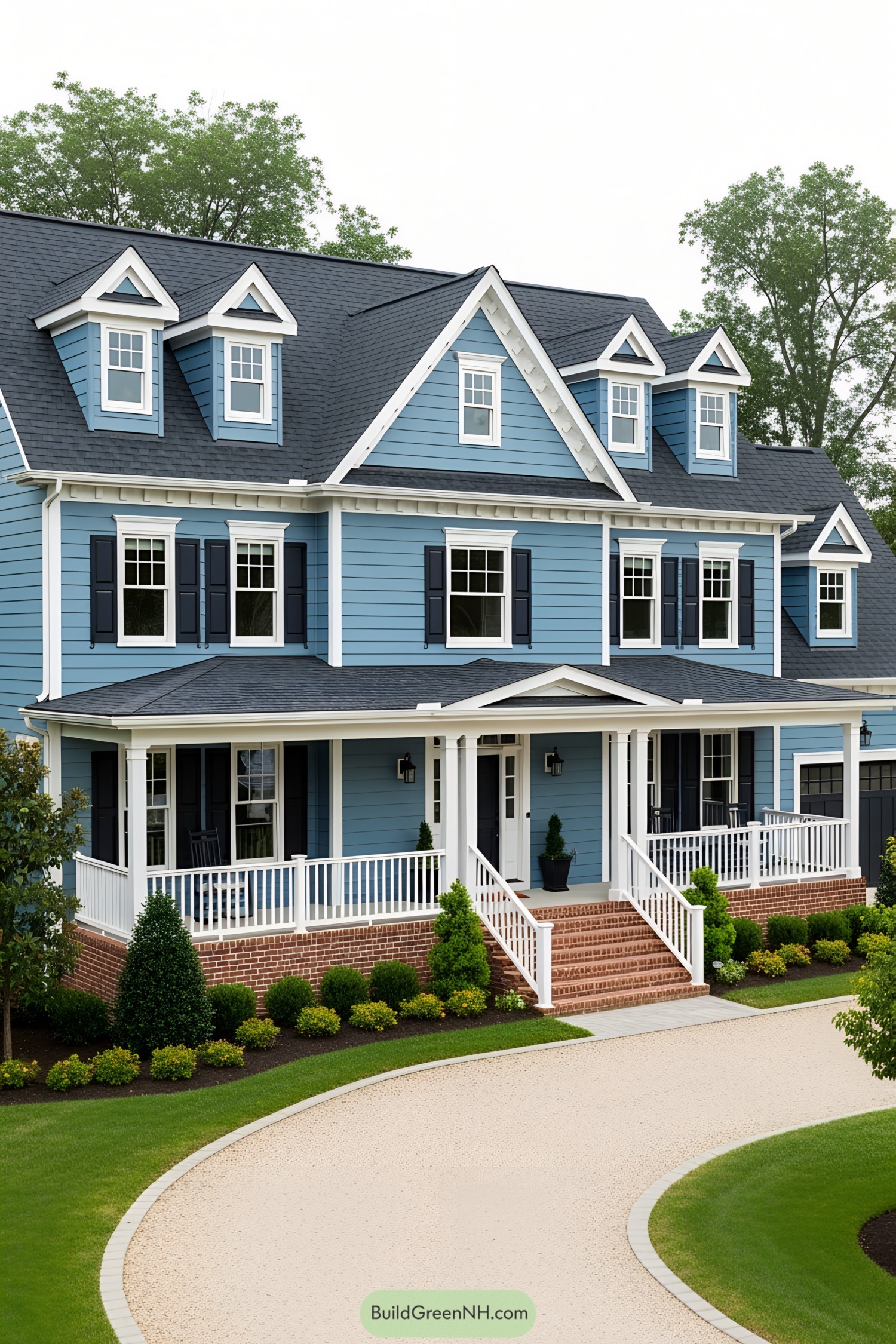 A large blue suburban house with a porch
