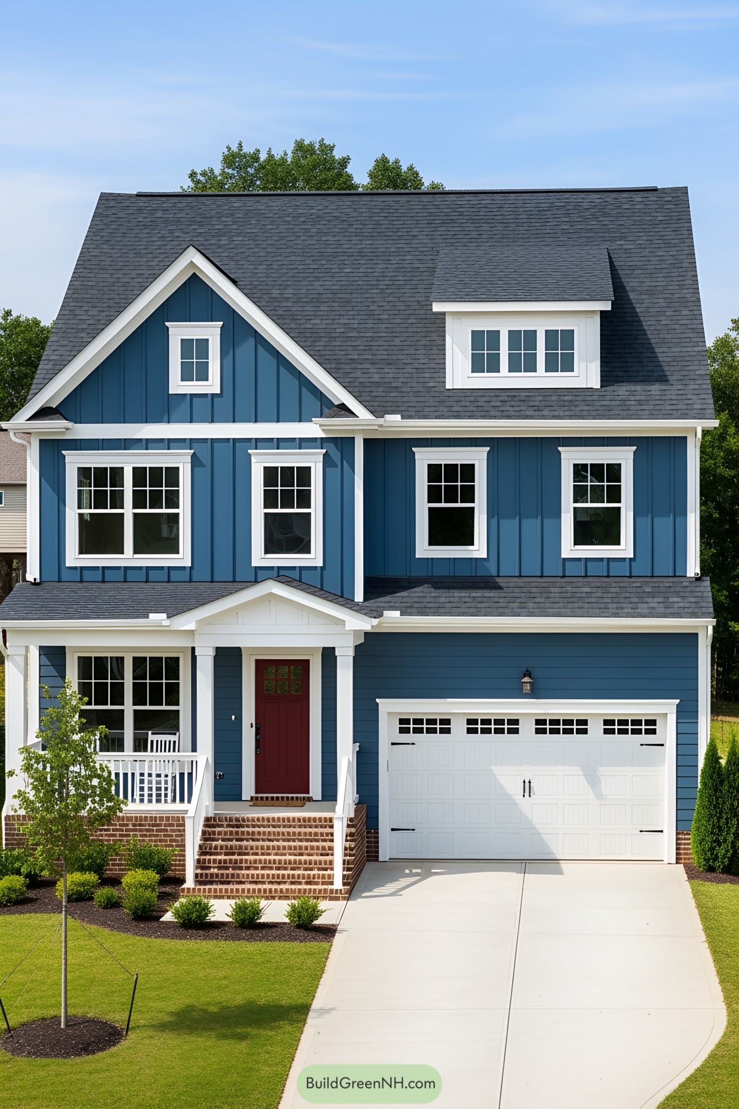 Blue suburban house with red door and white accents