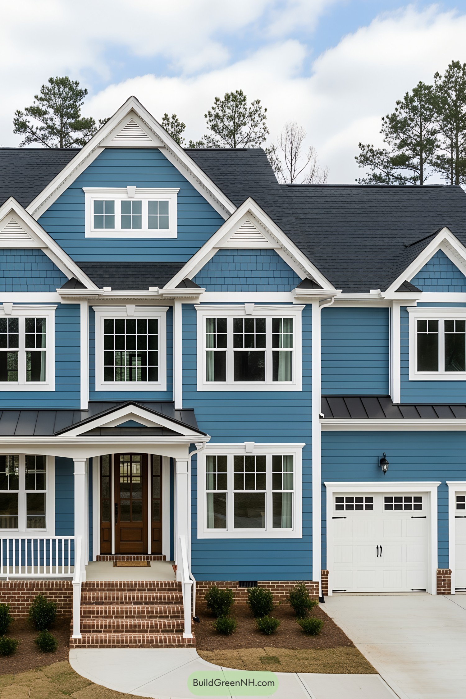 Blue suburban house with a classic design