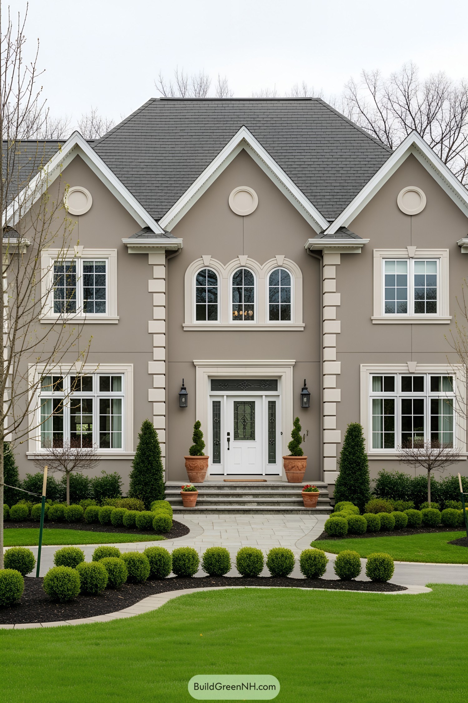 Elegant suburban home with manicured greenery
