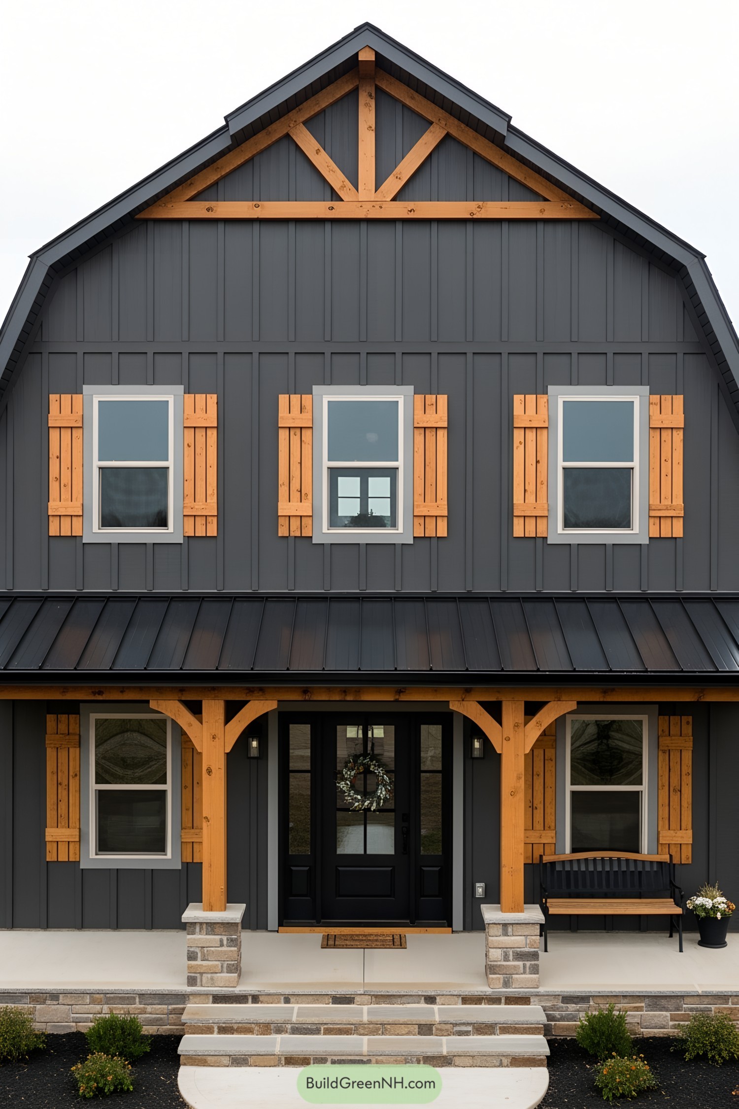 Dark gray barn house with wooden accents