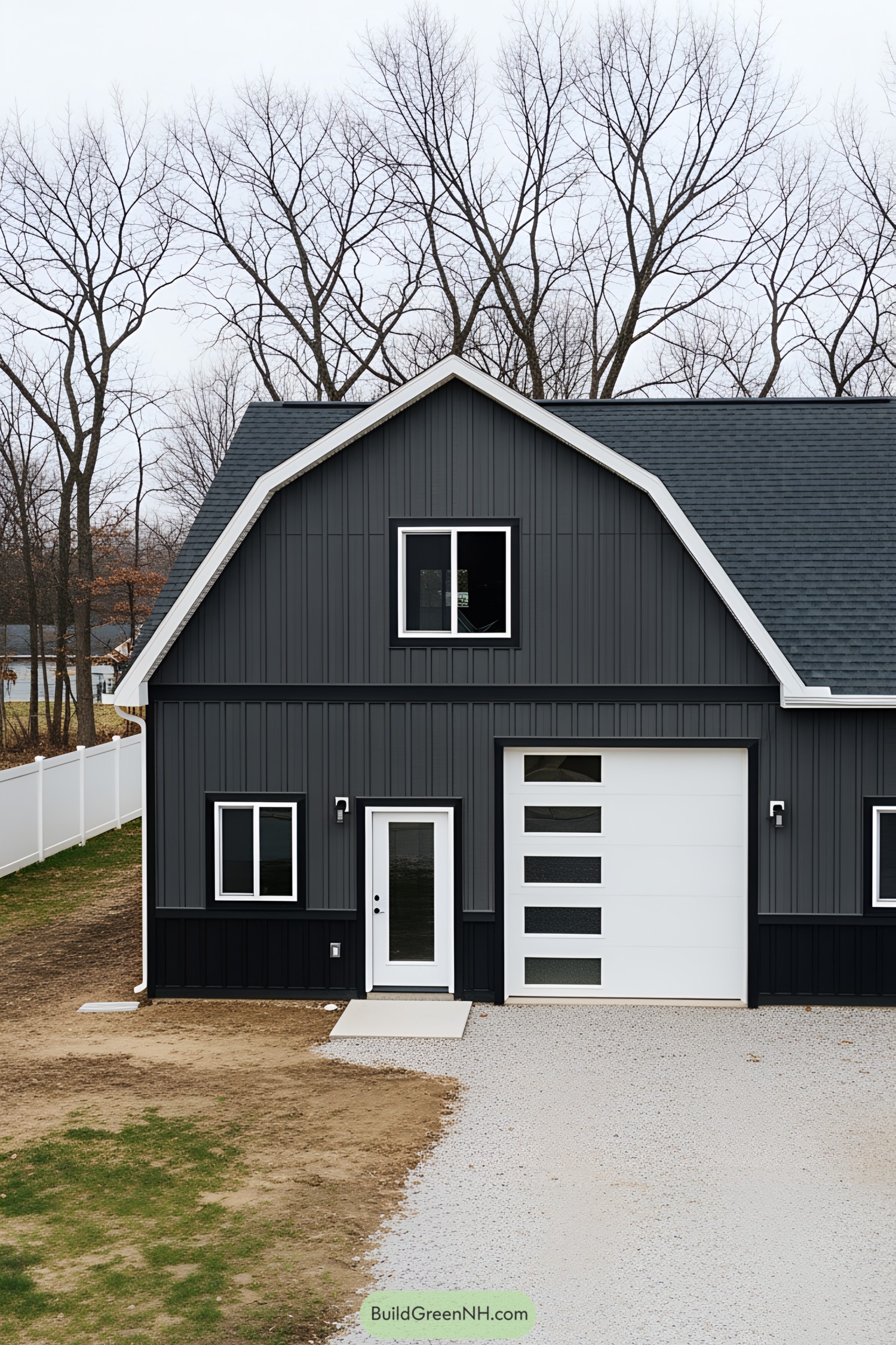 Dark gray barn with white accents
