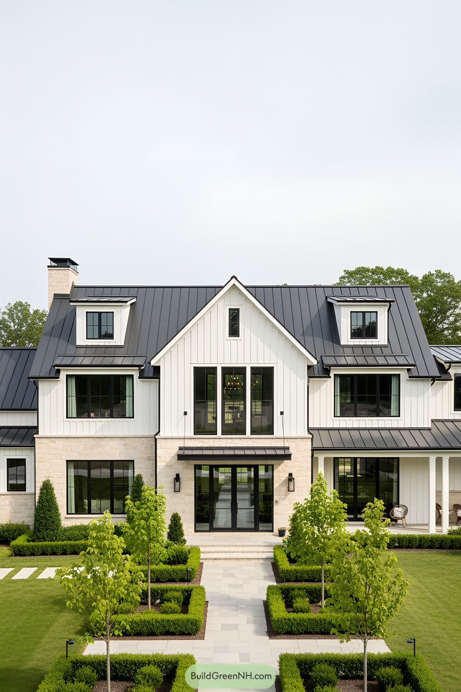 Modern farmhouse exterior with sleek roof and large windows