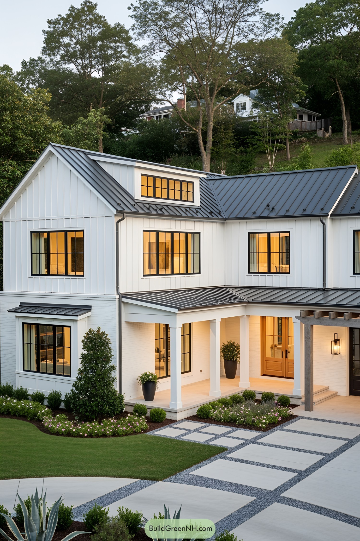 Modern farmhouse with white siding and sleek black trim