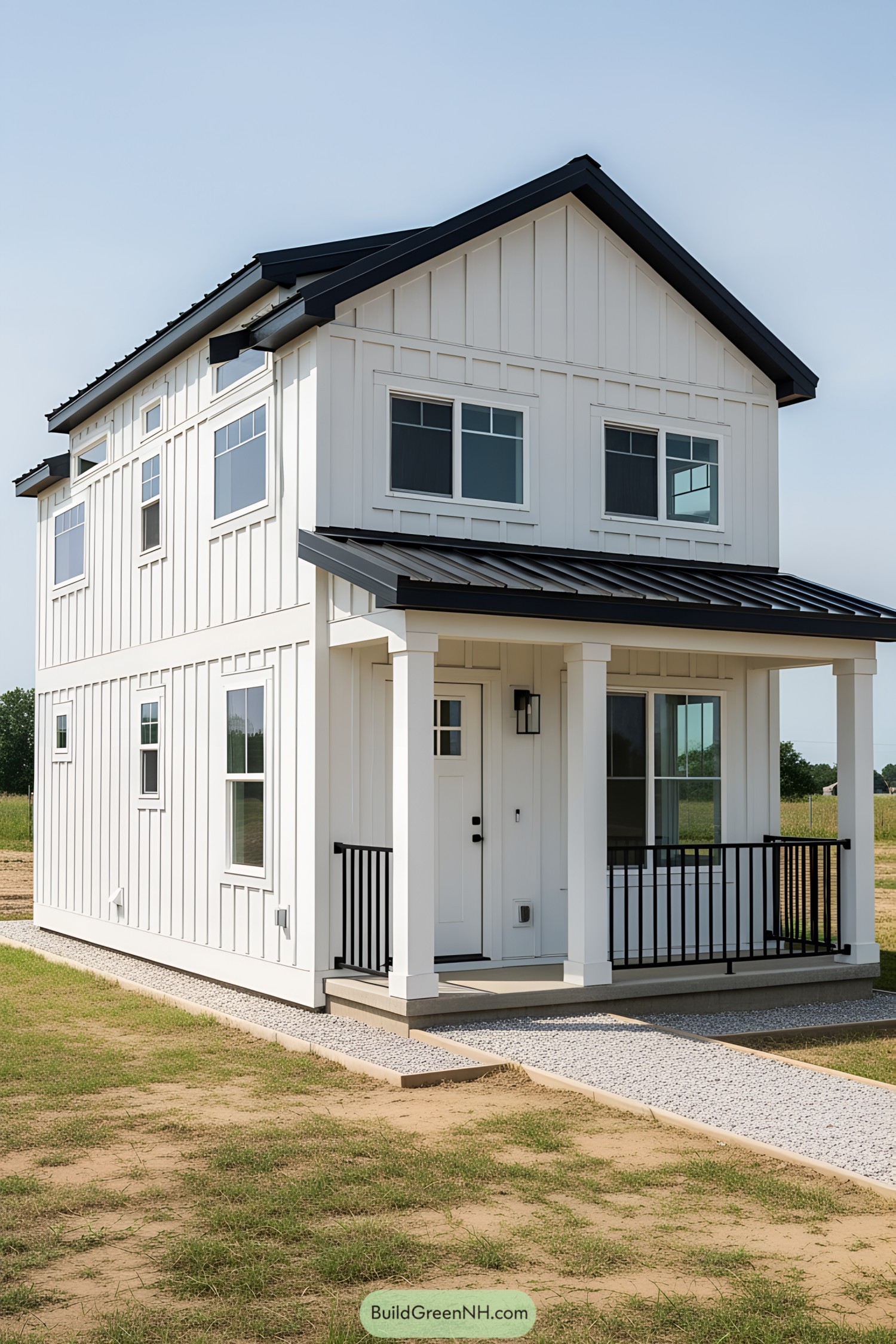 Compact farmhouse with white siding and a charming porch