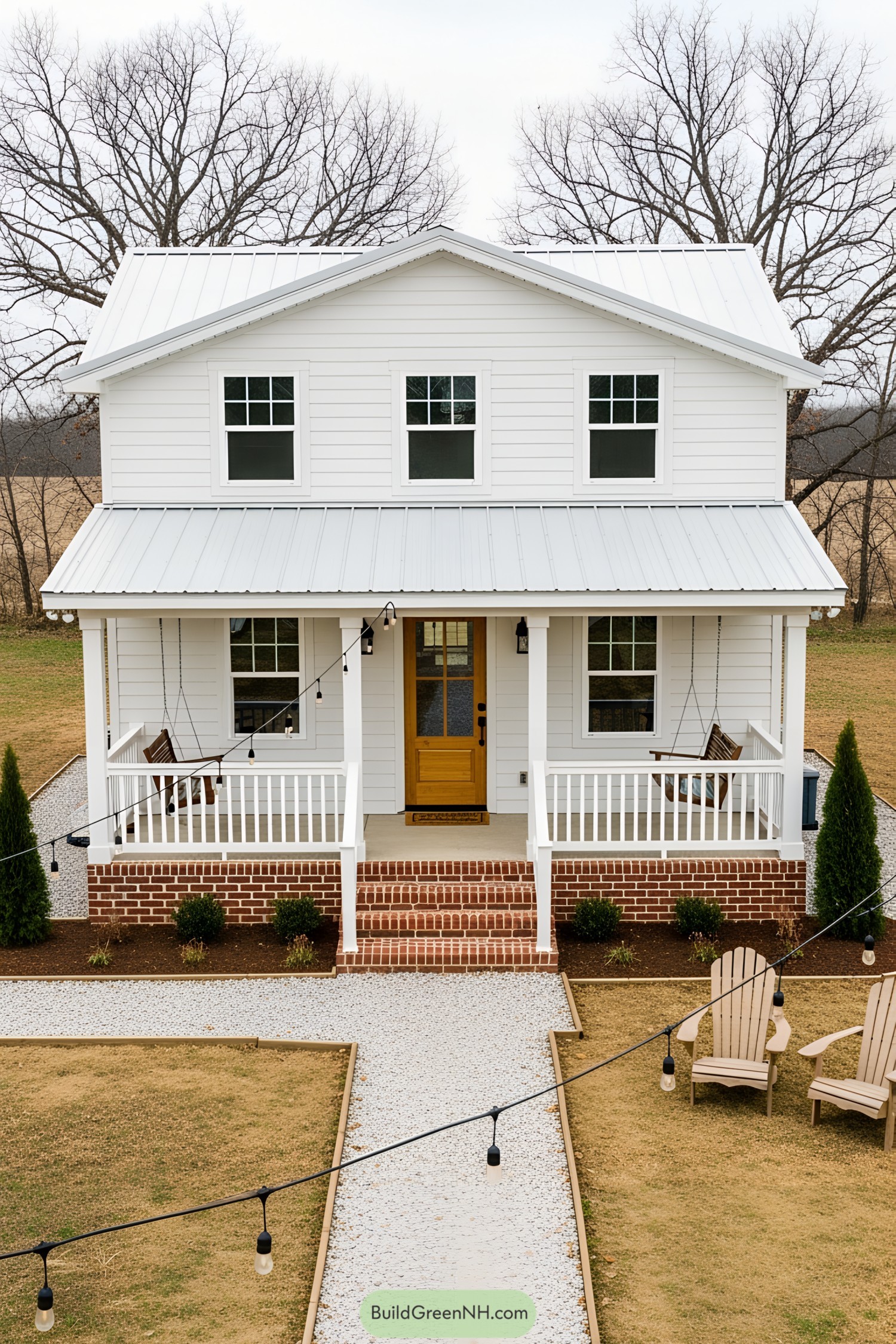 Tiny white farmhouse with a charming porch and inviting path