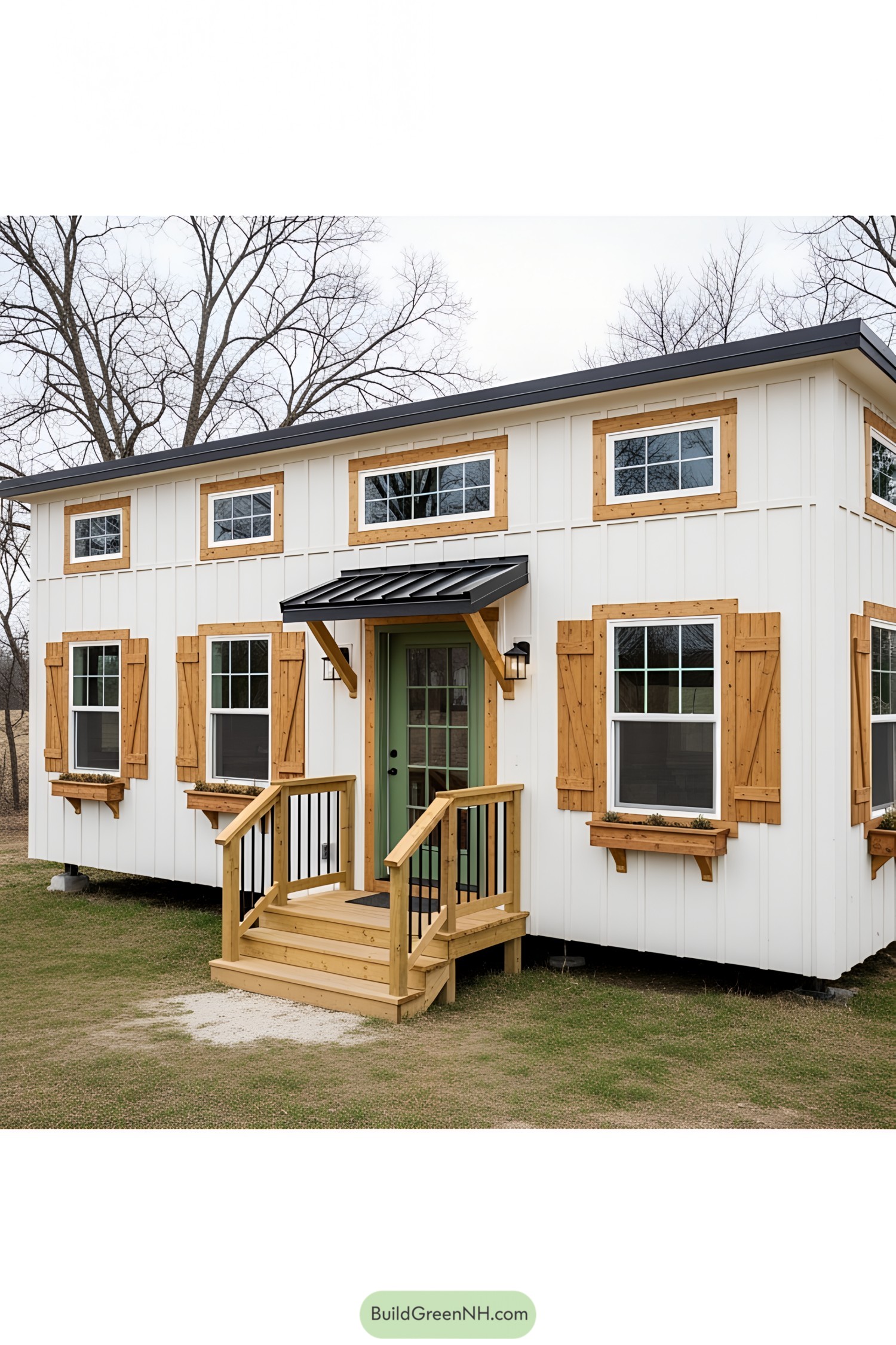 Compact farmhouse with wooden shutters and a charming porch