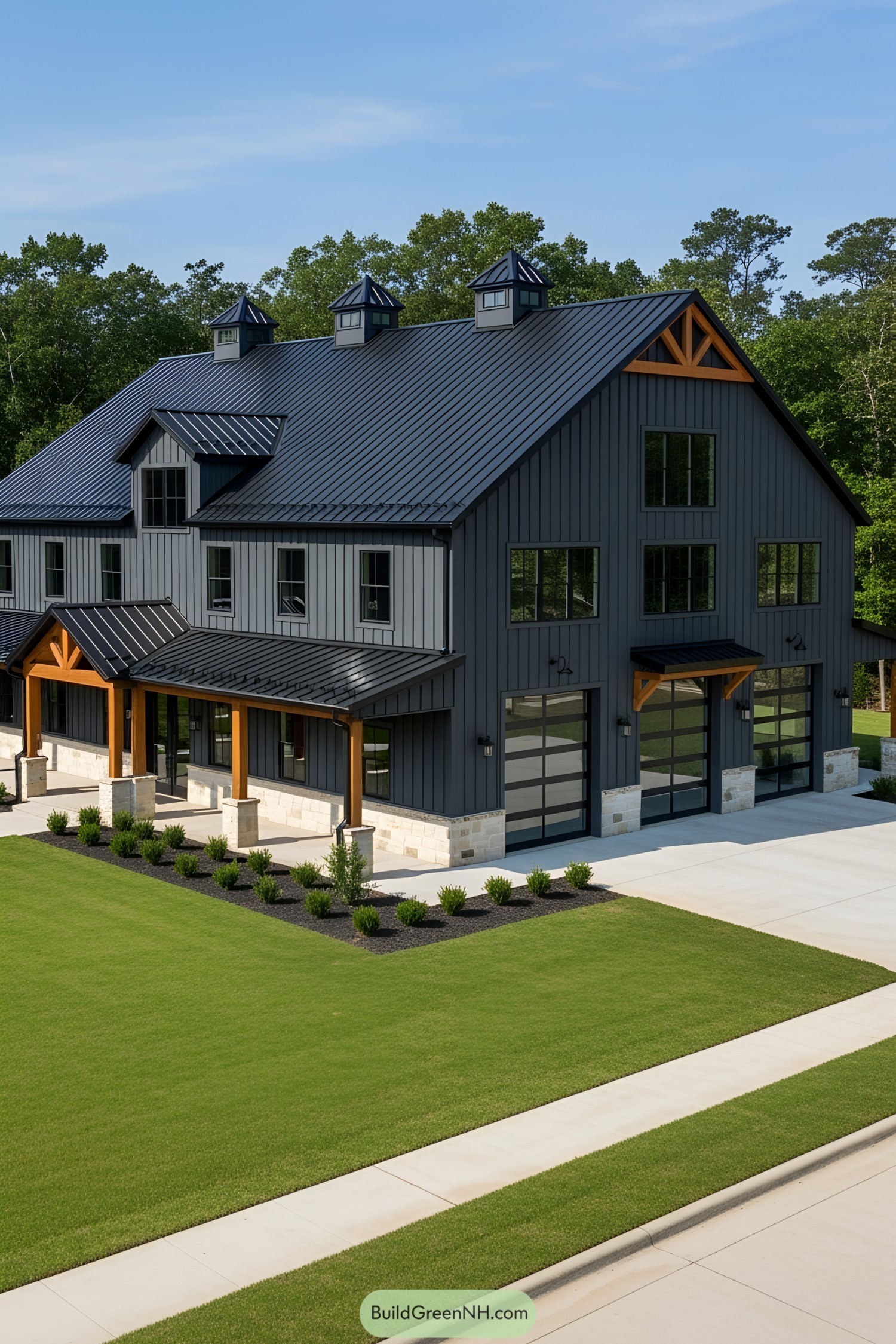 A gigantic barn-style home with a pristine lawn