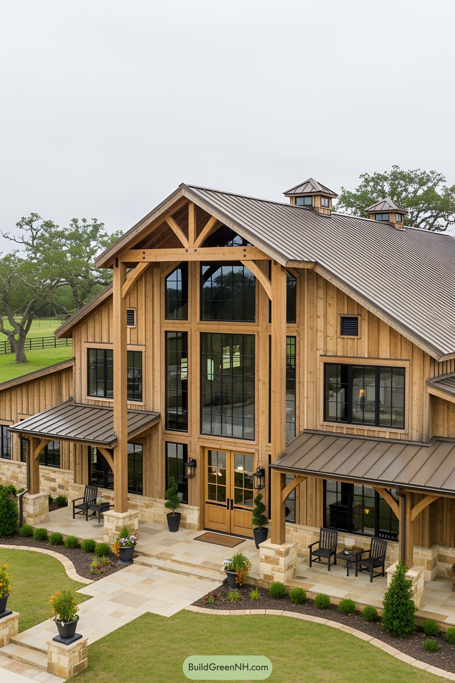 Spacious barndominium with wooden façade and large glass windows