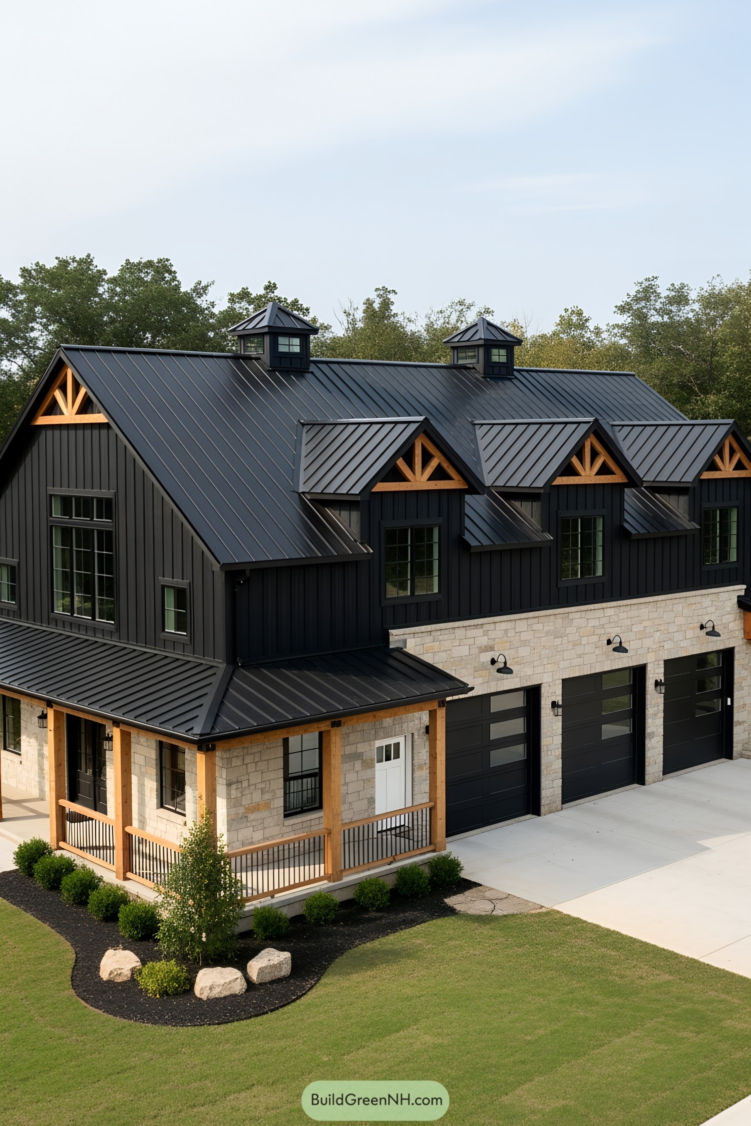 A massive barndominium with sleek black and stone finishes
