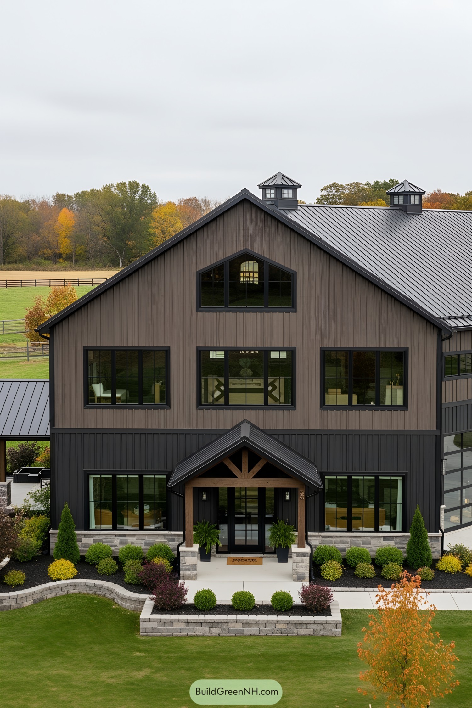 Massive barndominium with sleek design and extensive windows