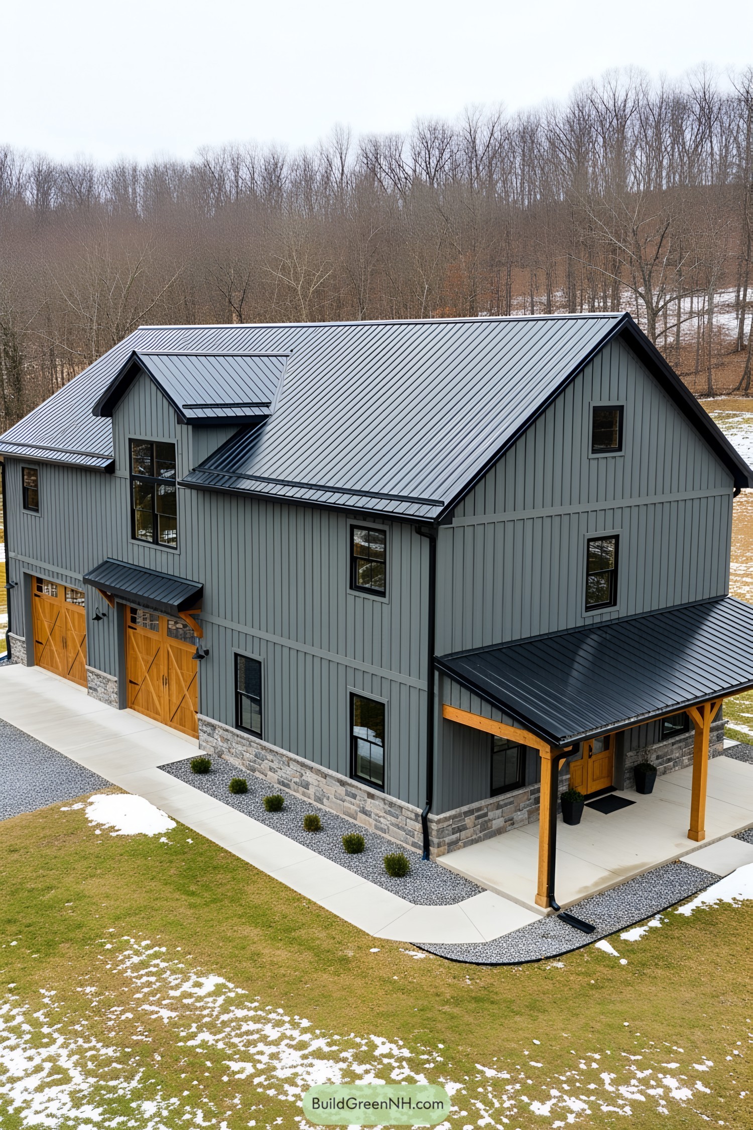 Gray barn with wooden accents and metal roof