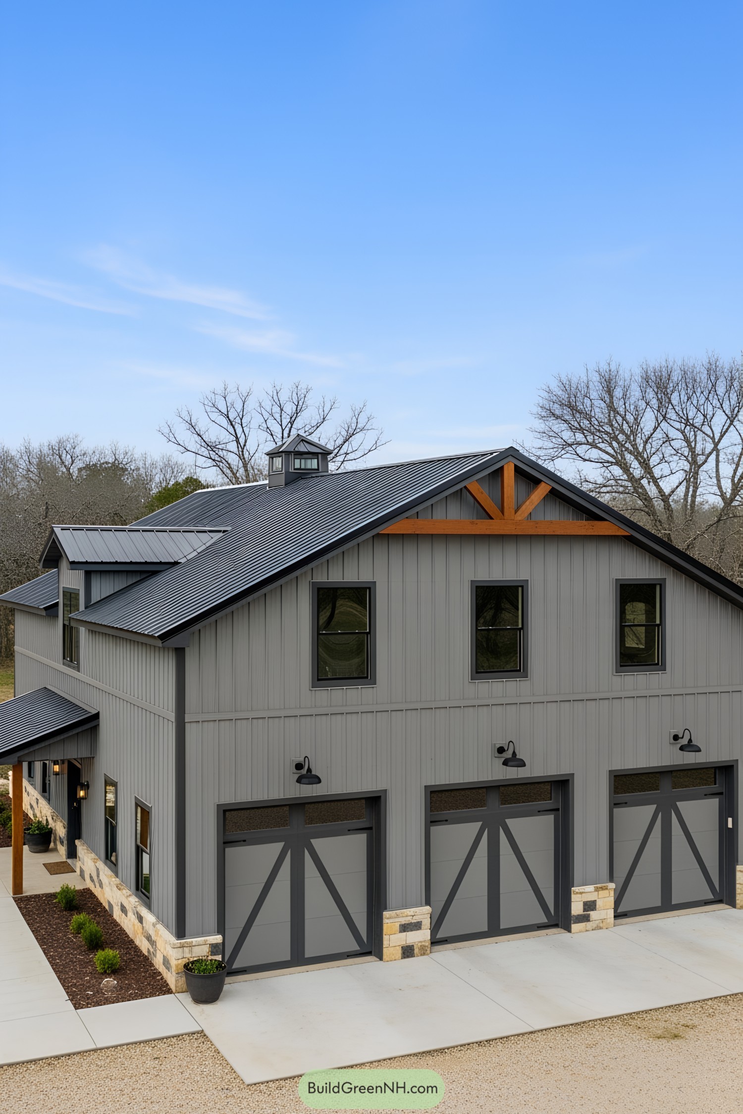 Sleek gray barn with modern features and large windows