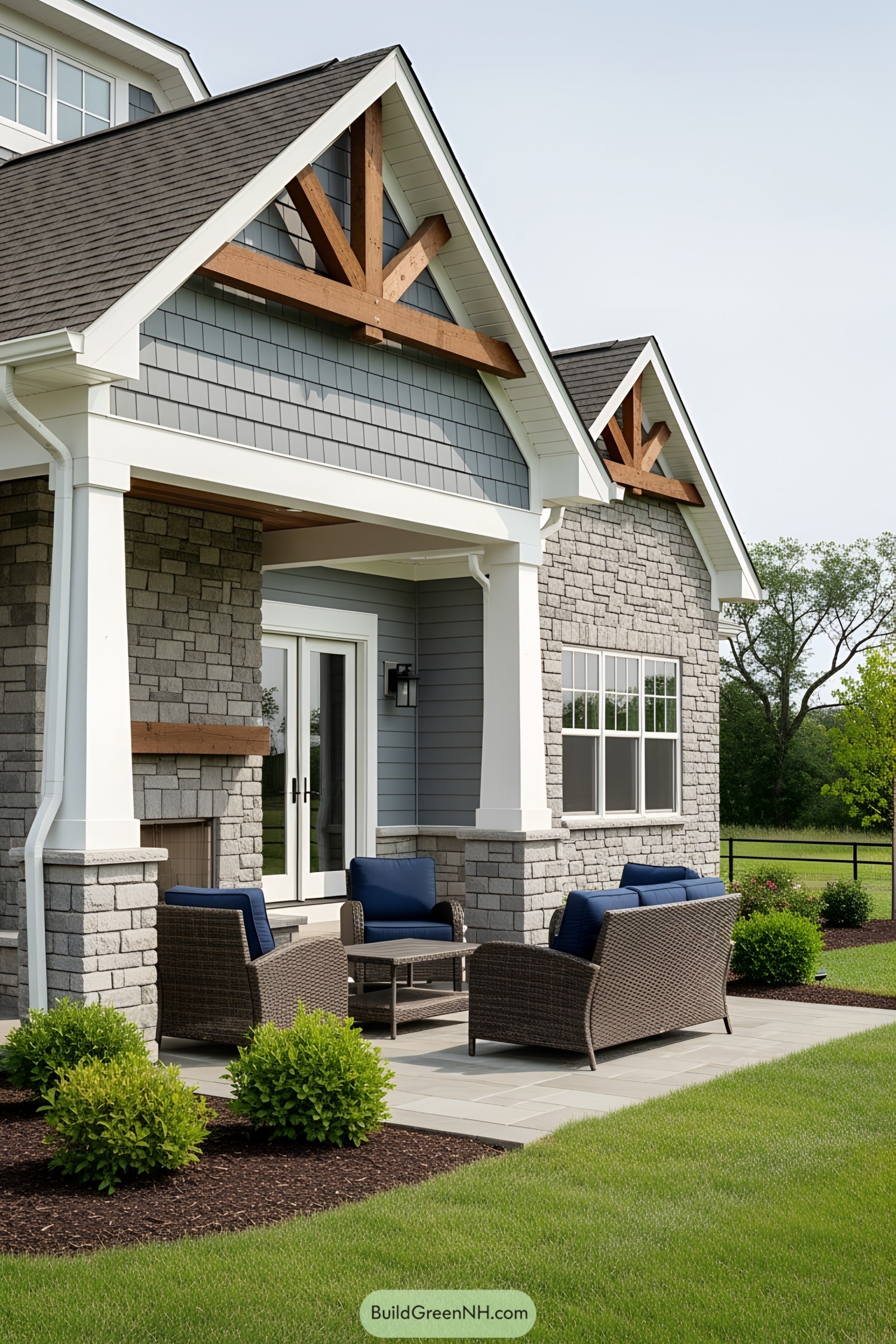 Stylish outdoor patio with blue cushioned furniture