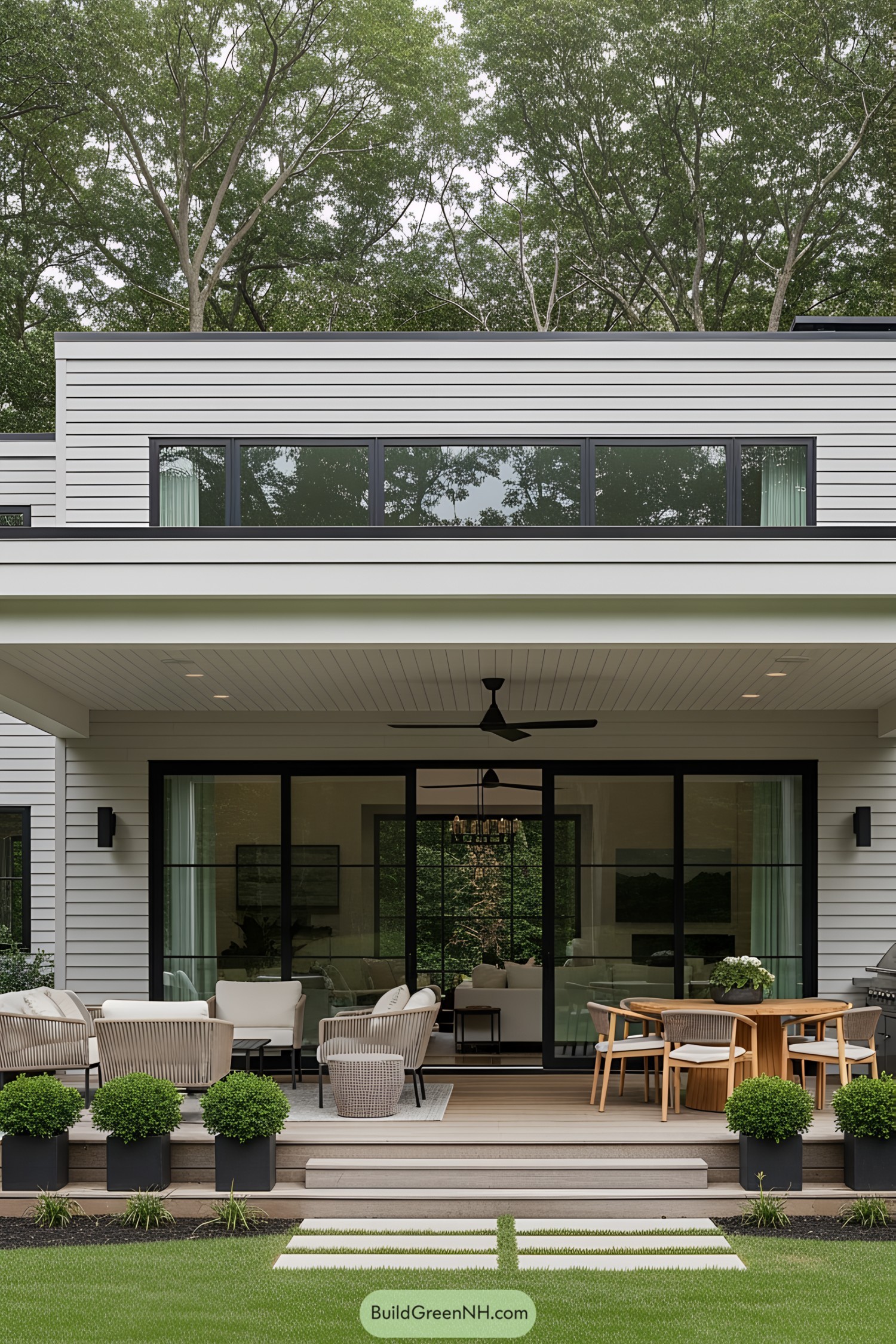 Minimalist patio with plush seating and lush surroundings