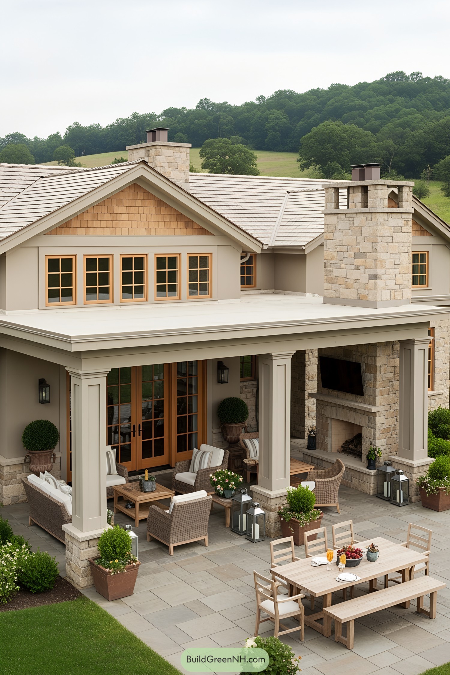 Outdoor seating area with patio in front of a stylish, countryside home