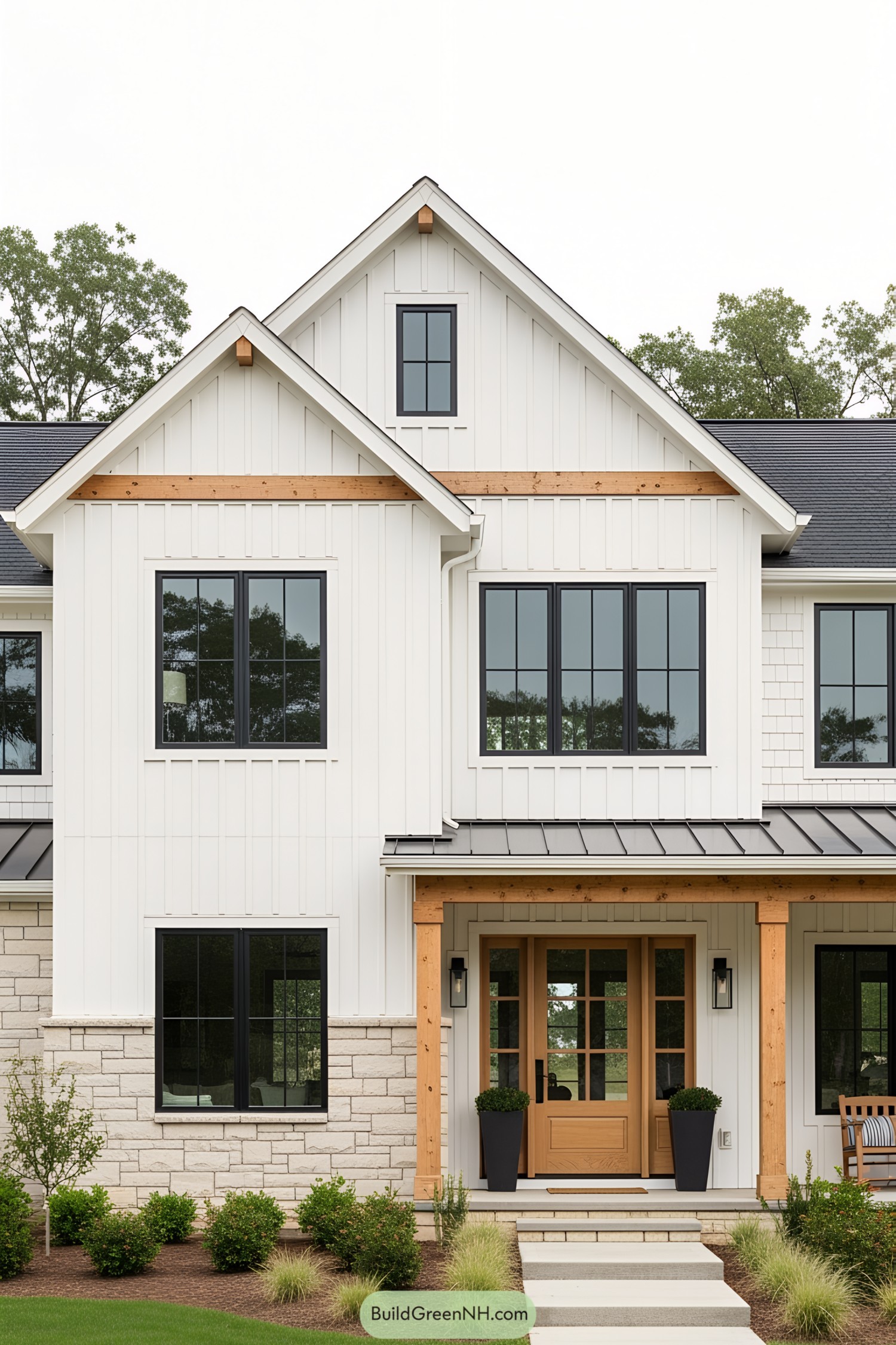 House with white siding and wooden beams, featuring large black-framed windows