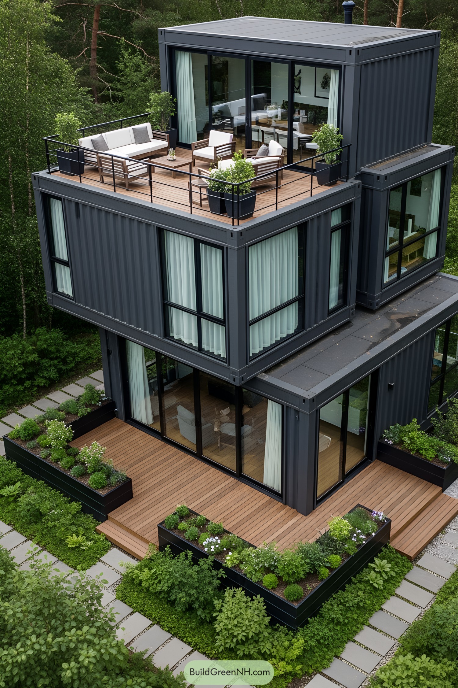 A stylish multi-level container home surrounded by lush greenery