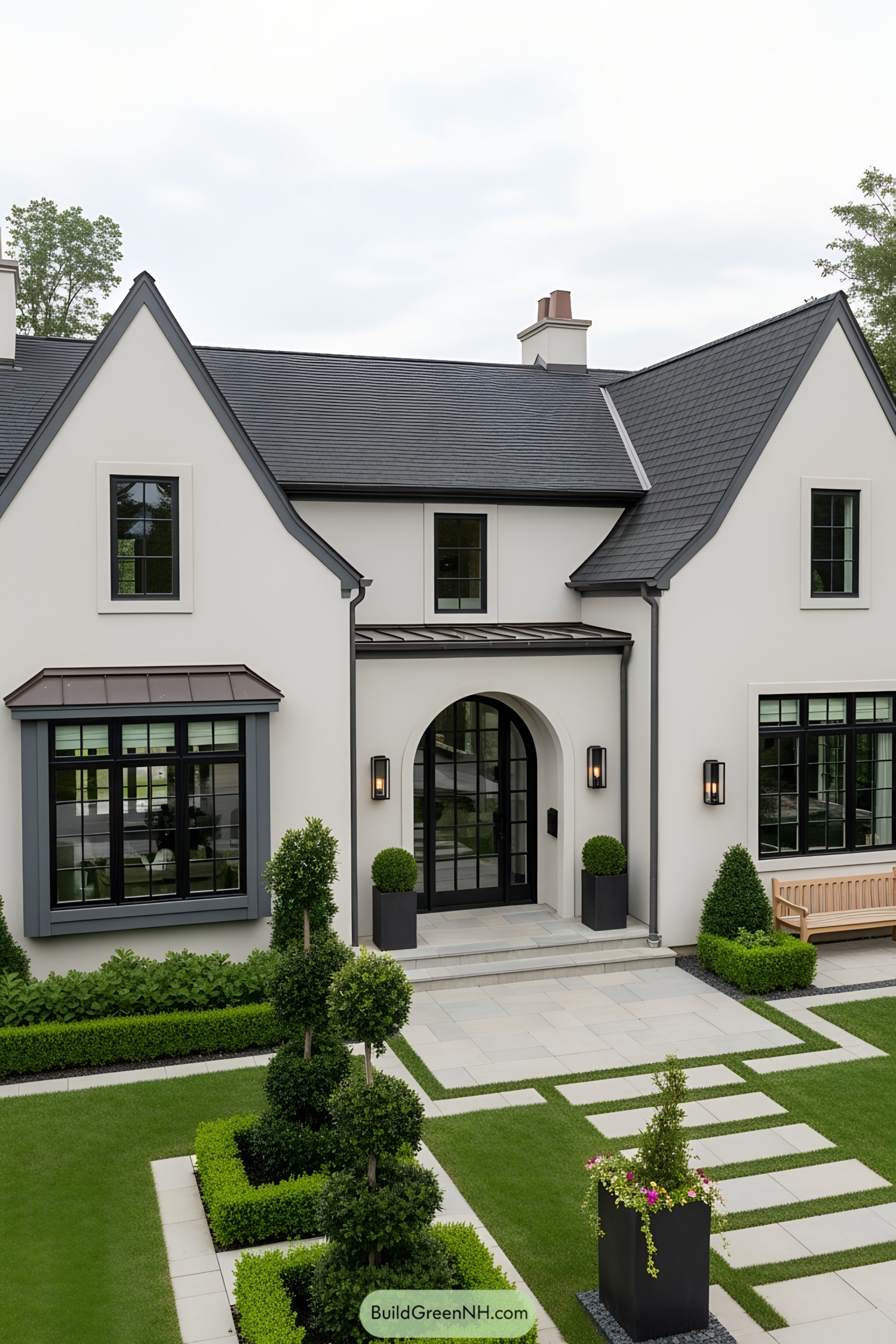 Modern European cottage with sleek design and structured garden