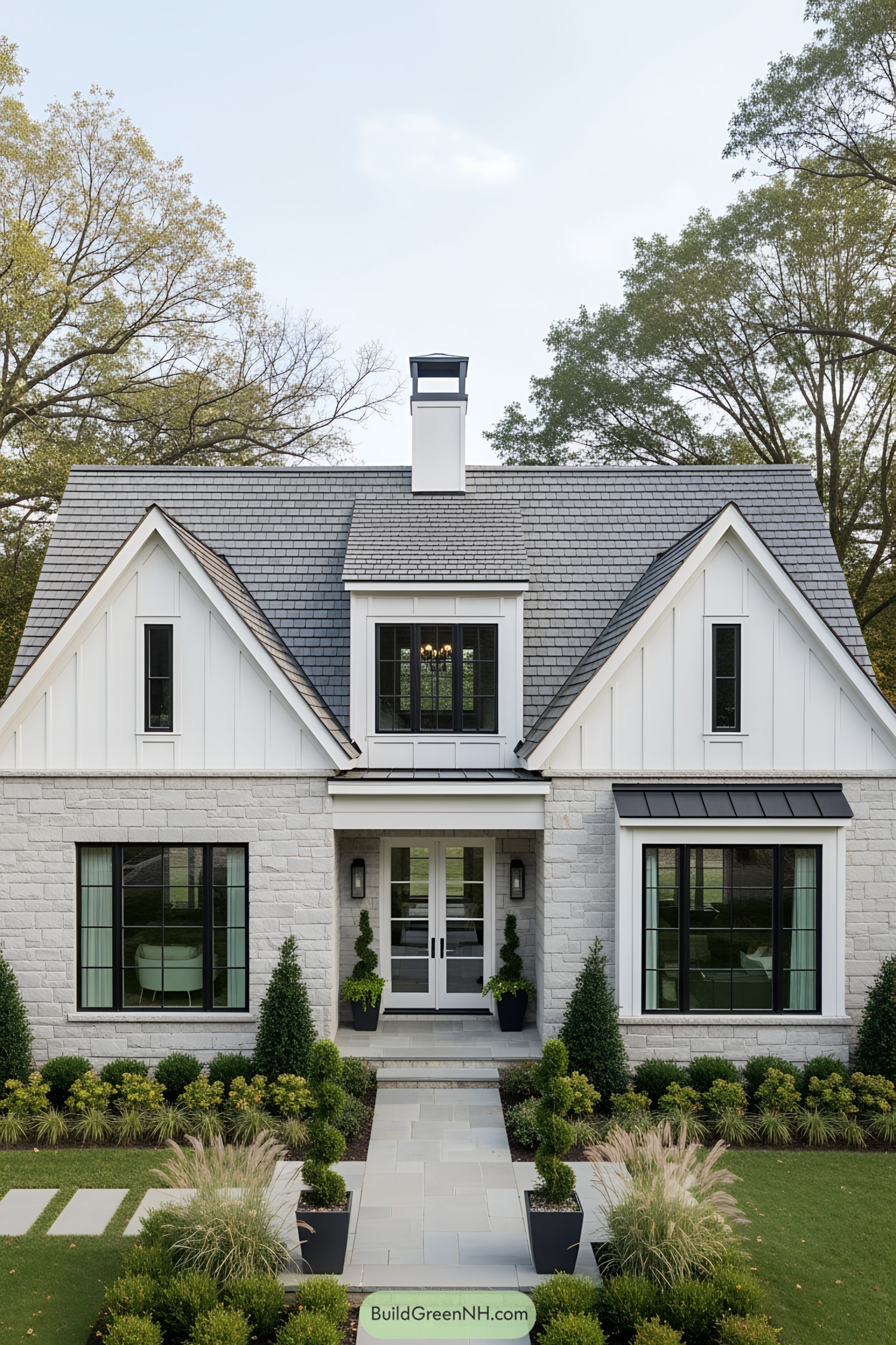 Modern cottage with gabled roof and lush garden