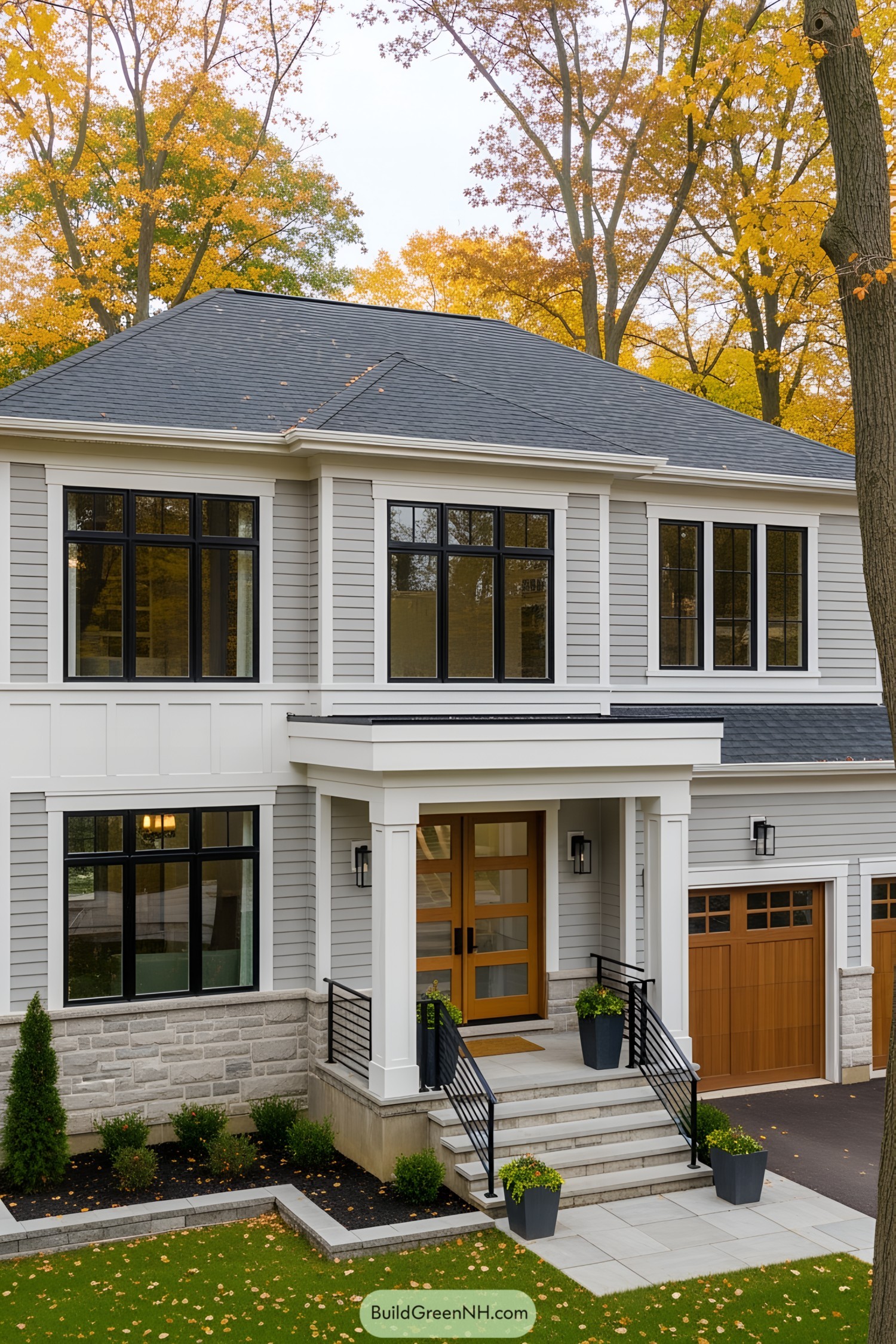 Modern house with striking black windows and inviting entrance