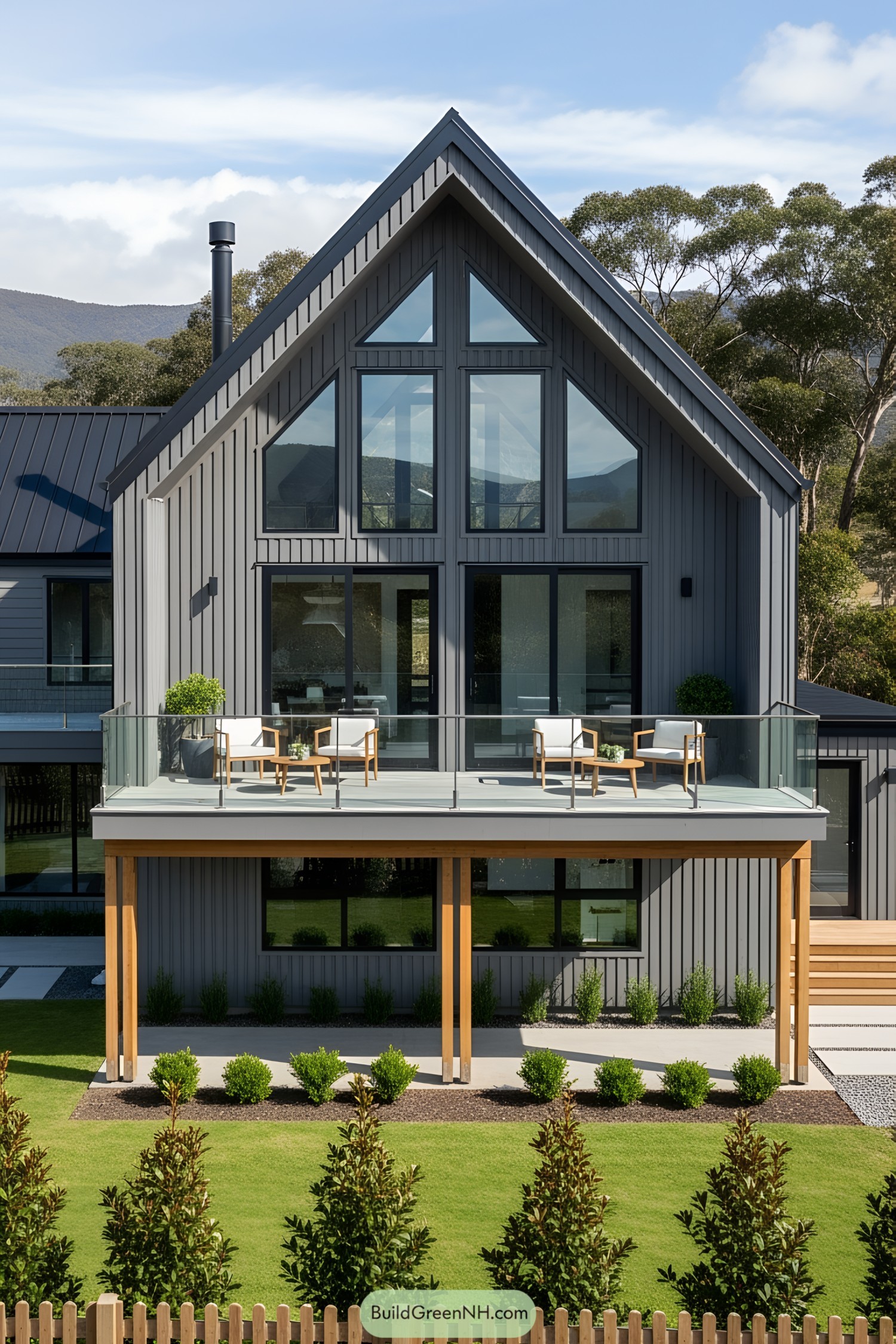 Modern home with large glass-fronted deck and lush garden