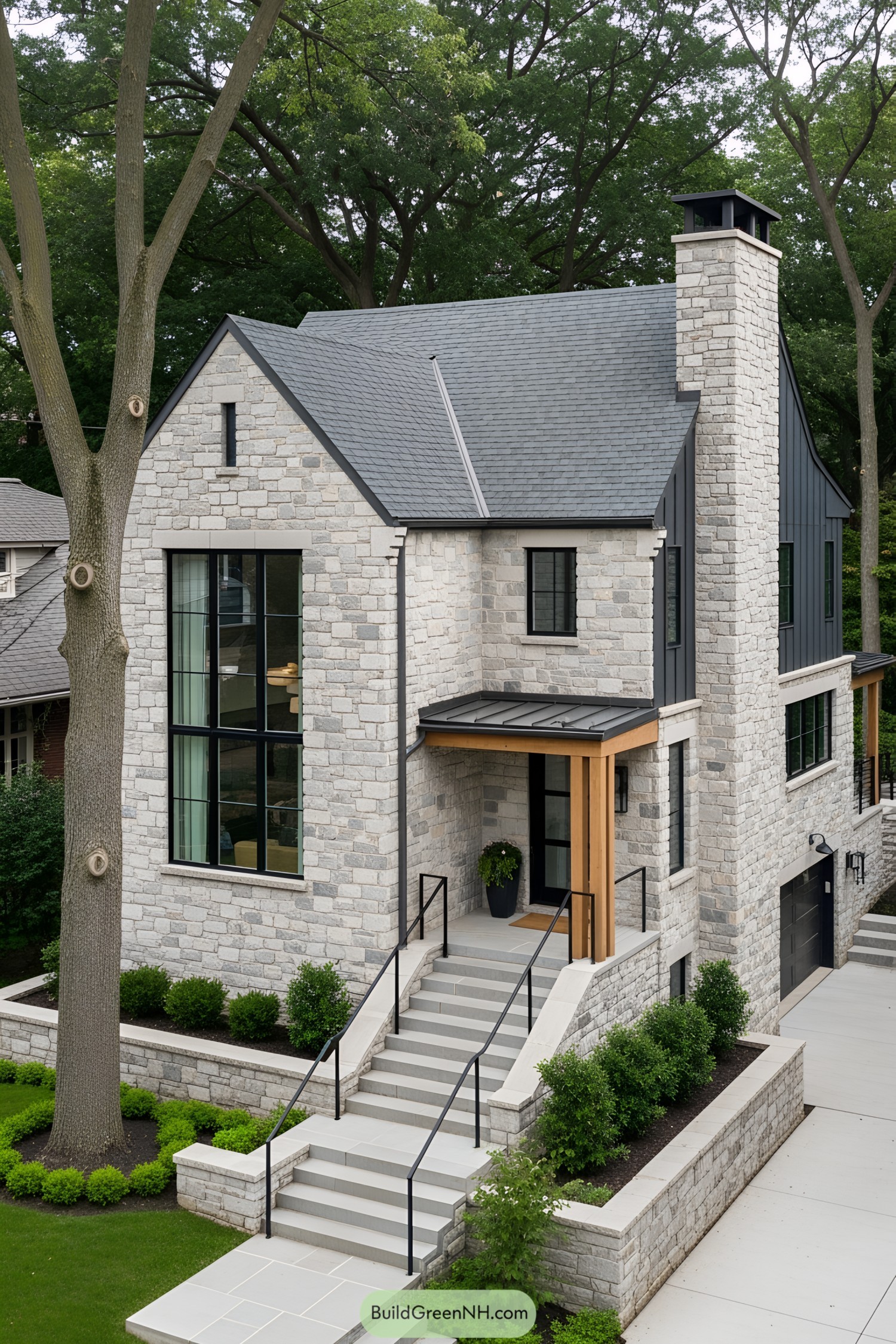 Modern stone cottage with large windows and sleek design