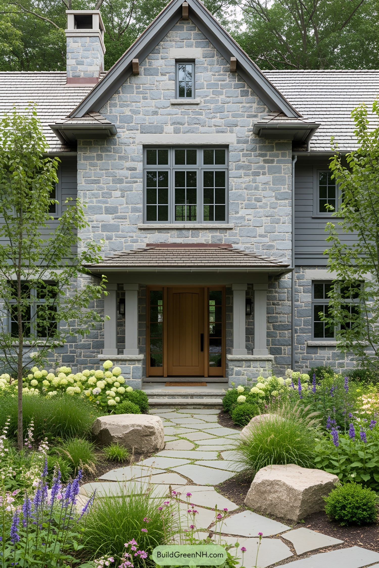 Charming stone cottage with lush garden pathway
