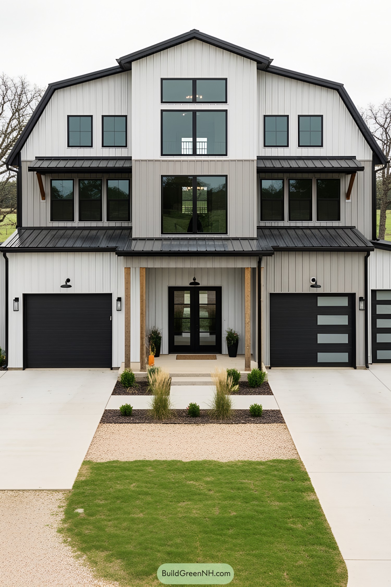 Modern barndominium with sleek black accents