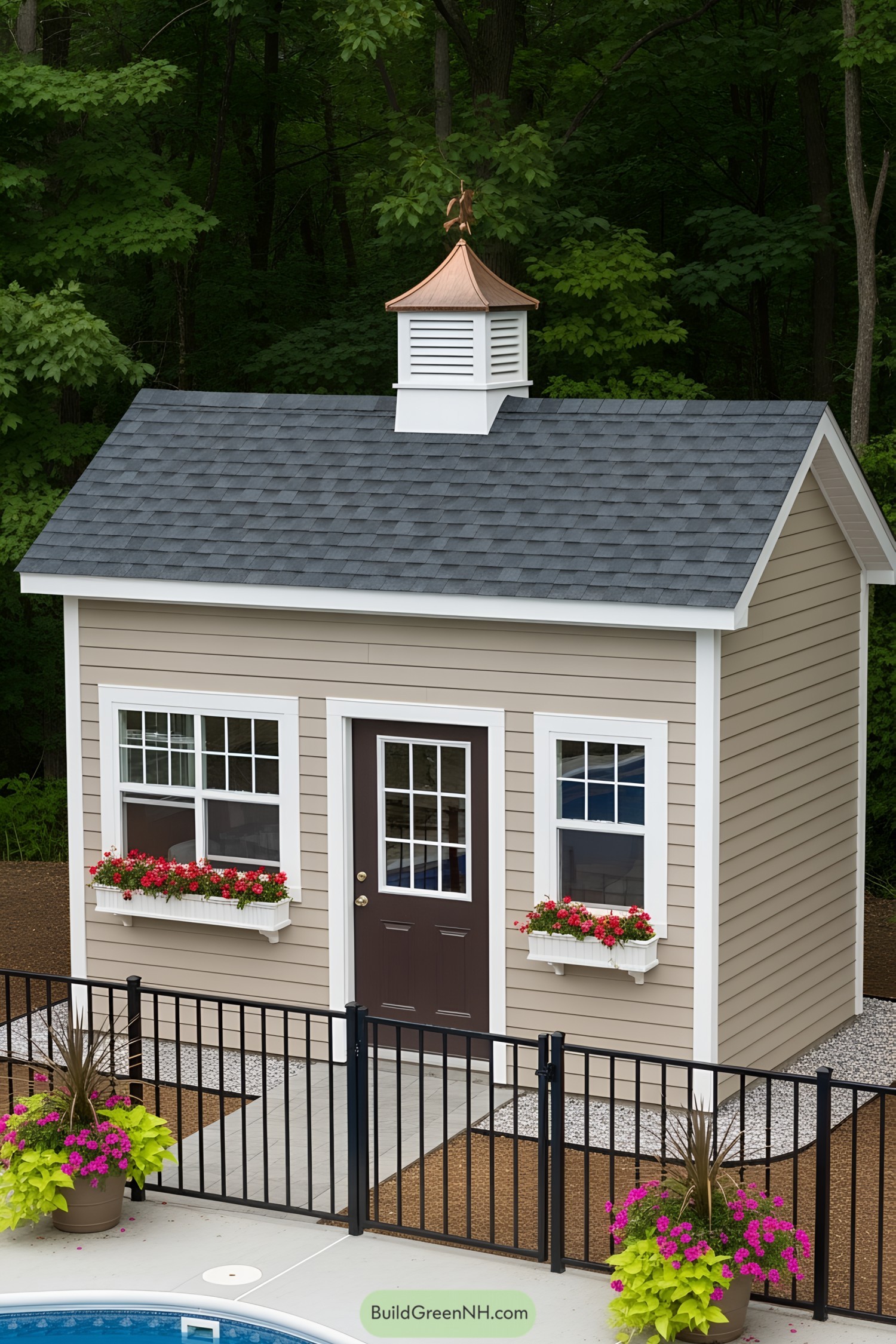 Charming poolside shed with flower boxes