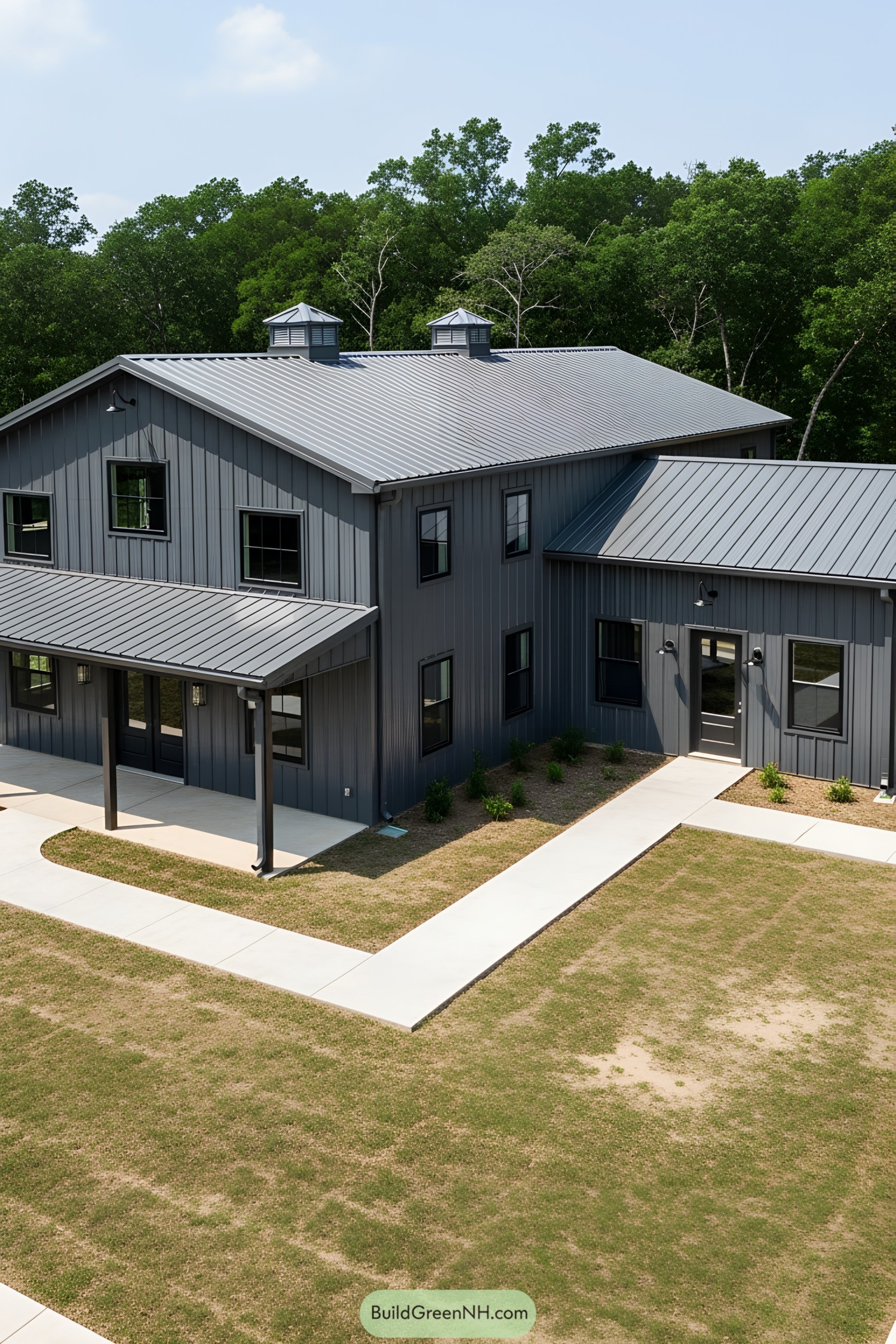 Modern barndominium with metal siding and roof